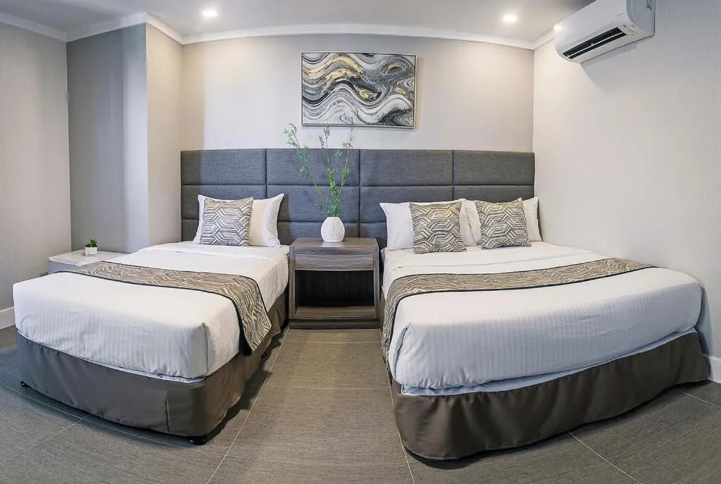 Bed in Anika Suites