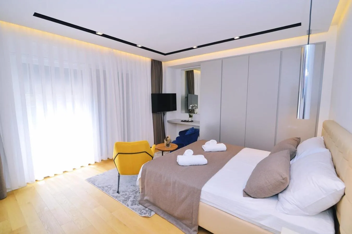 Bed in Apartments in Villa Ziza, rooftop swimming pool