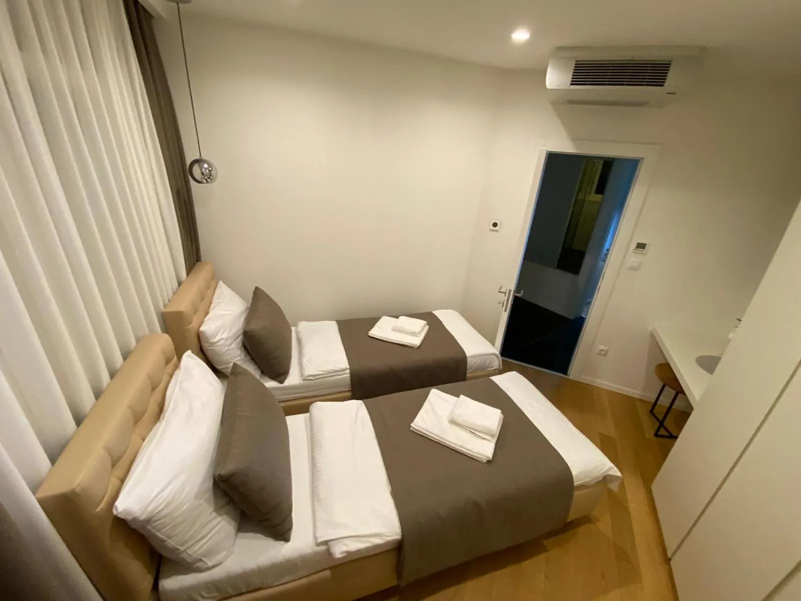 Bedroom, Bed in Apartments in Villa Ziza, rooftop swimming pool
