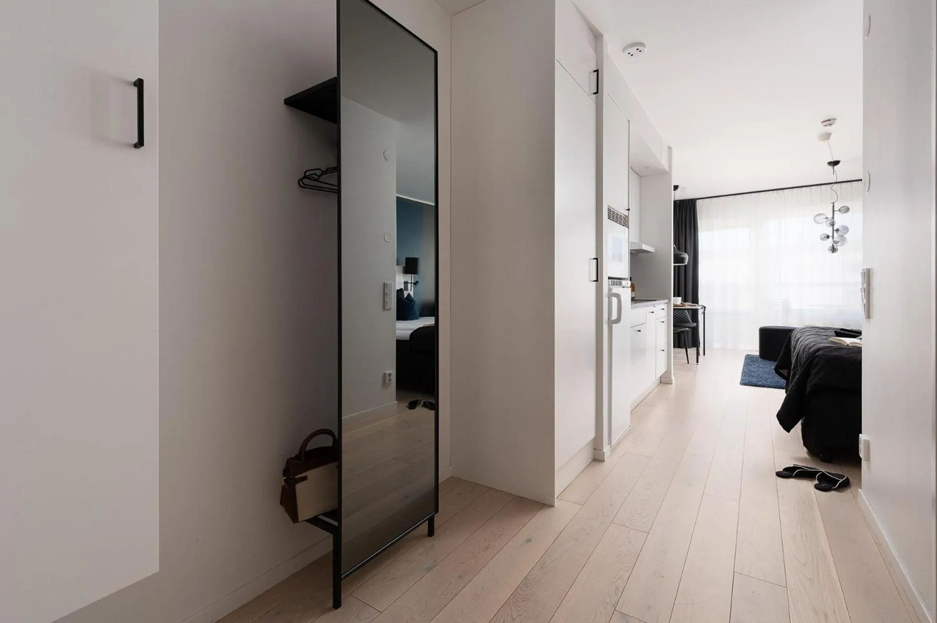 wardrobe in Sky Hotel City Apartments