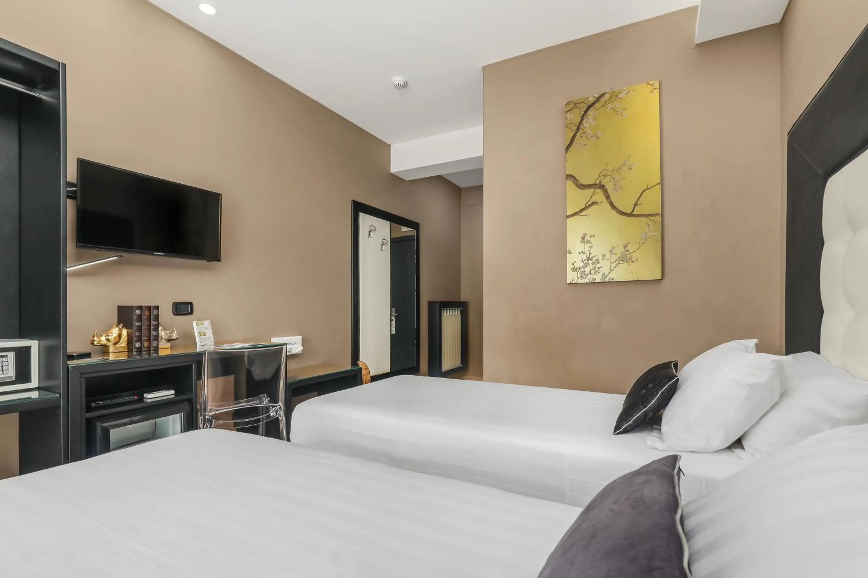 Bed in Reggia Suite Spa Hotel