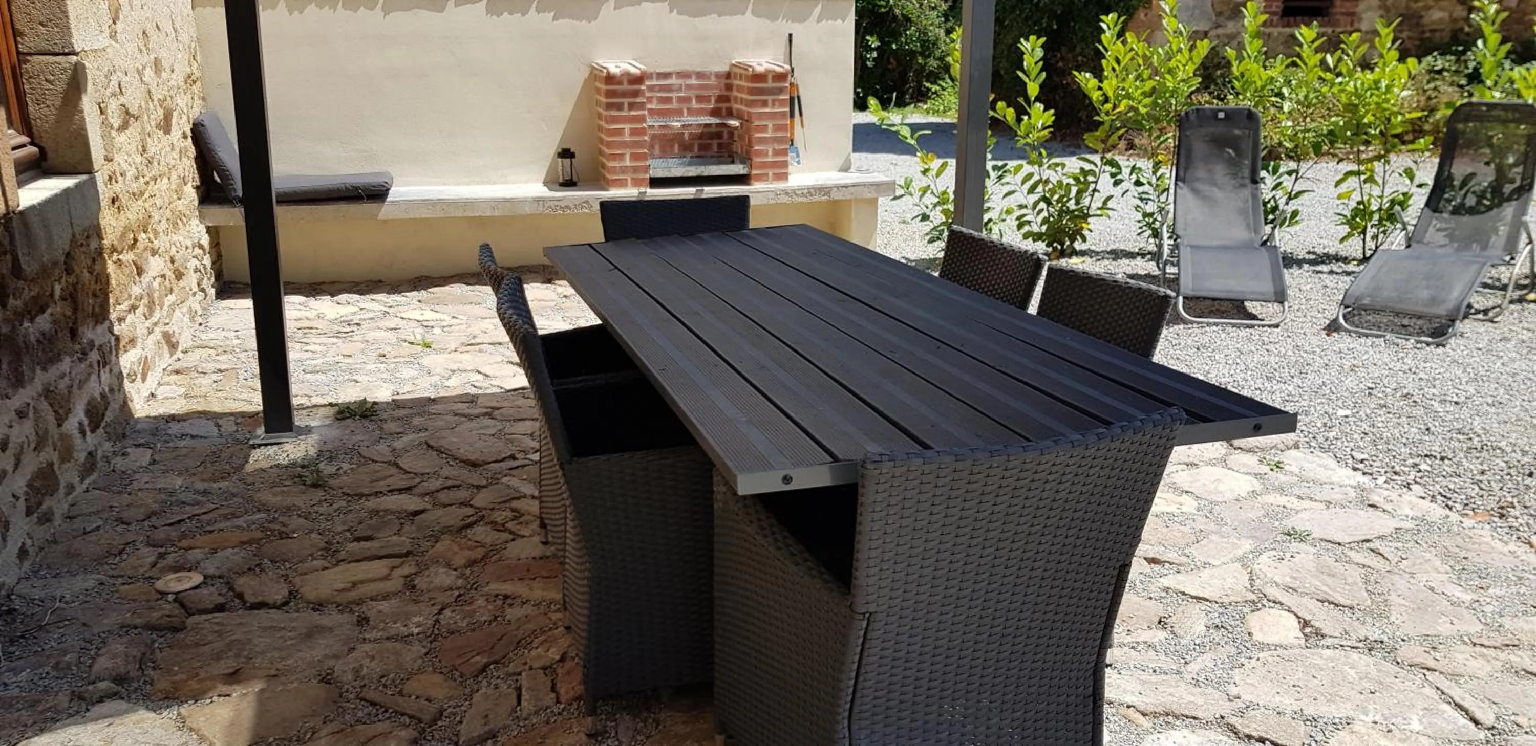 Patio in Gites Le Grand Tornage holiday fun for the whole family