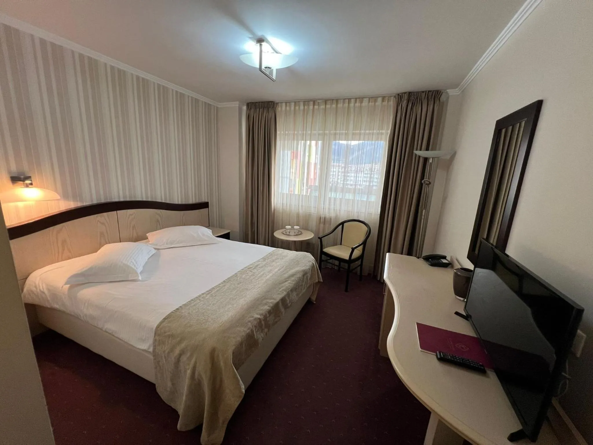 Bed in Caprioara Spa&Wellness Resort