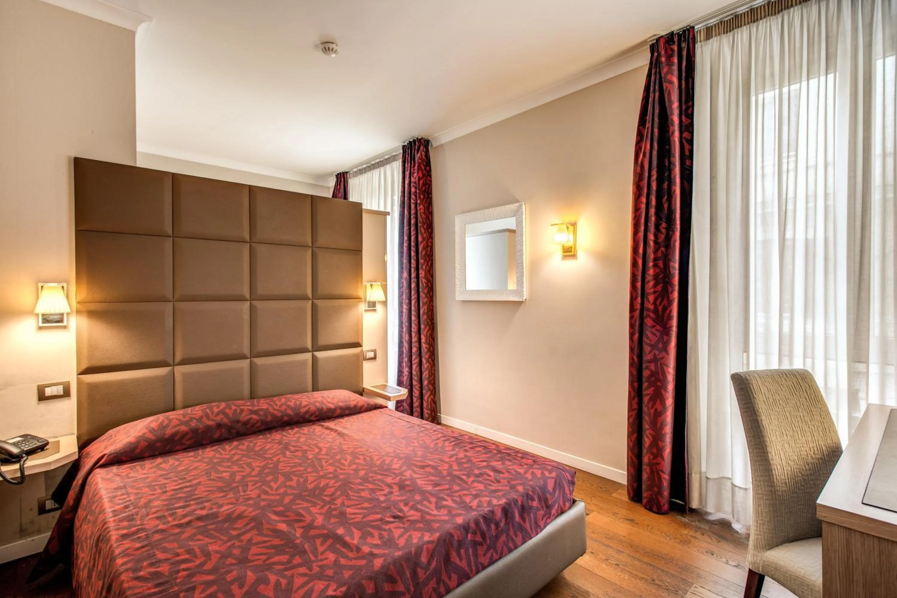 Bed in Boutique Rome Inn
