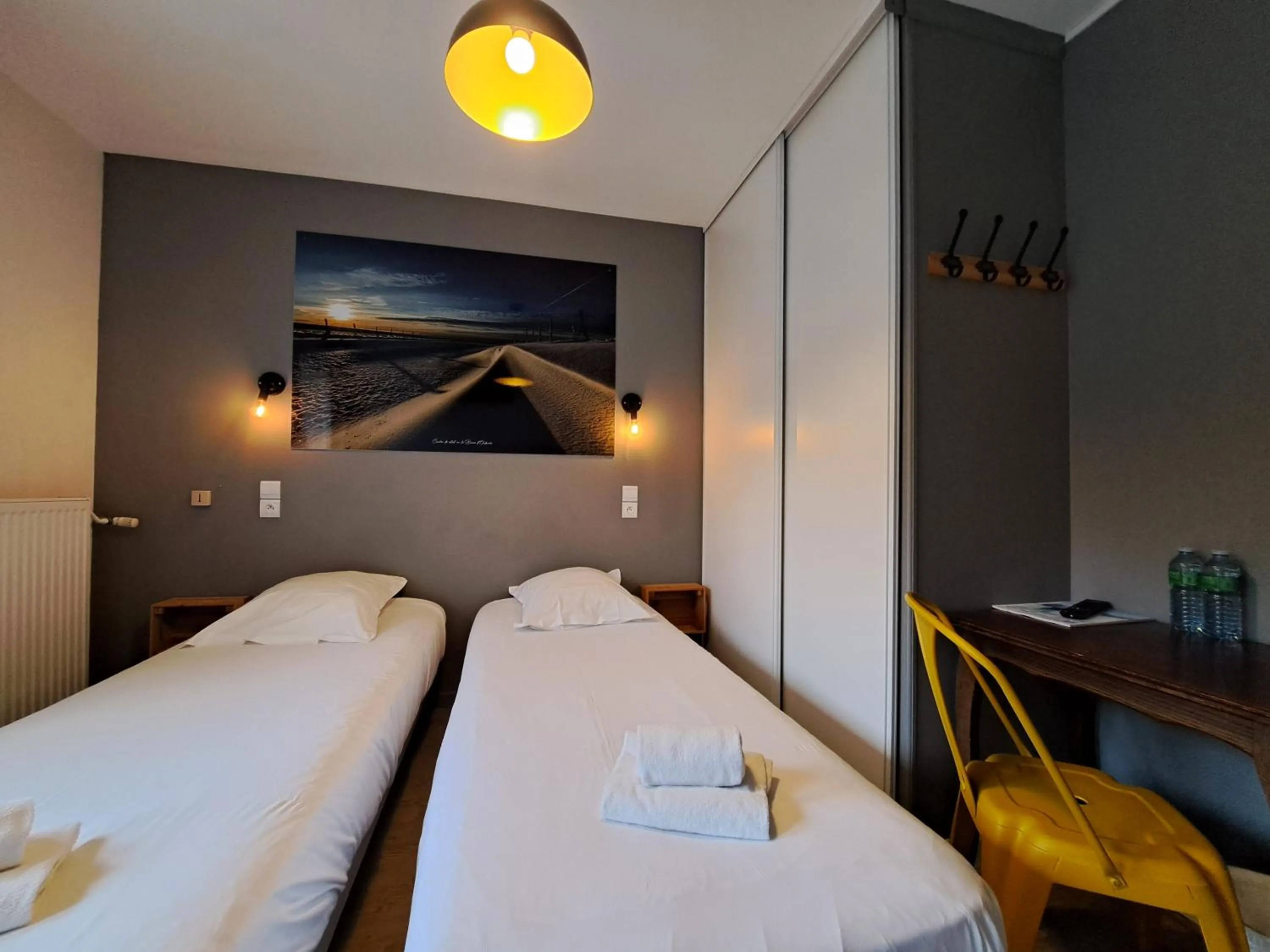 Bed in Hôtel Les Mouflons