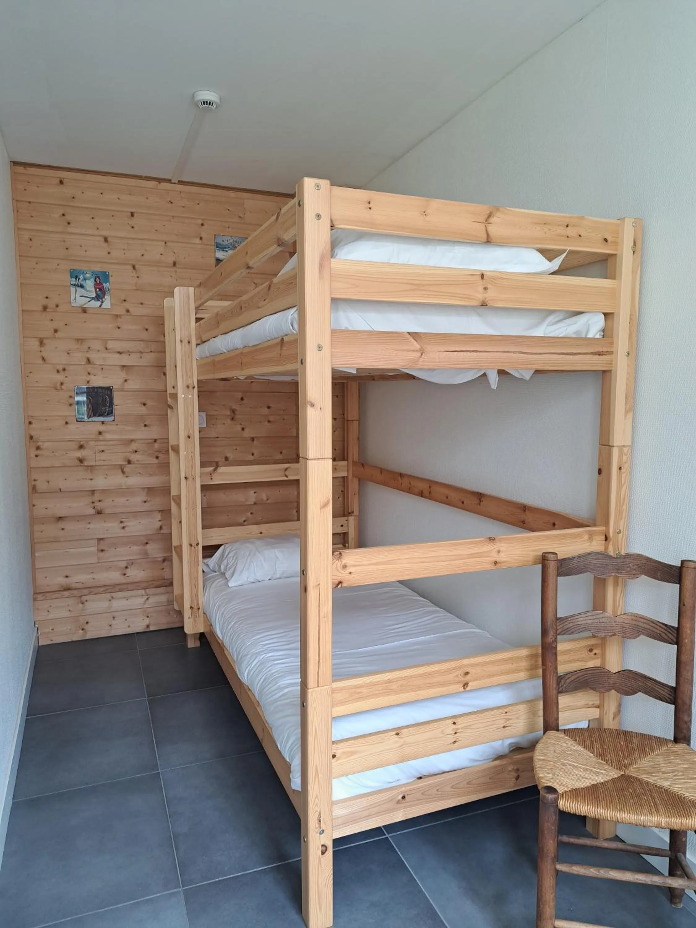 Bedroom in Hôtel Les Mouflons