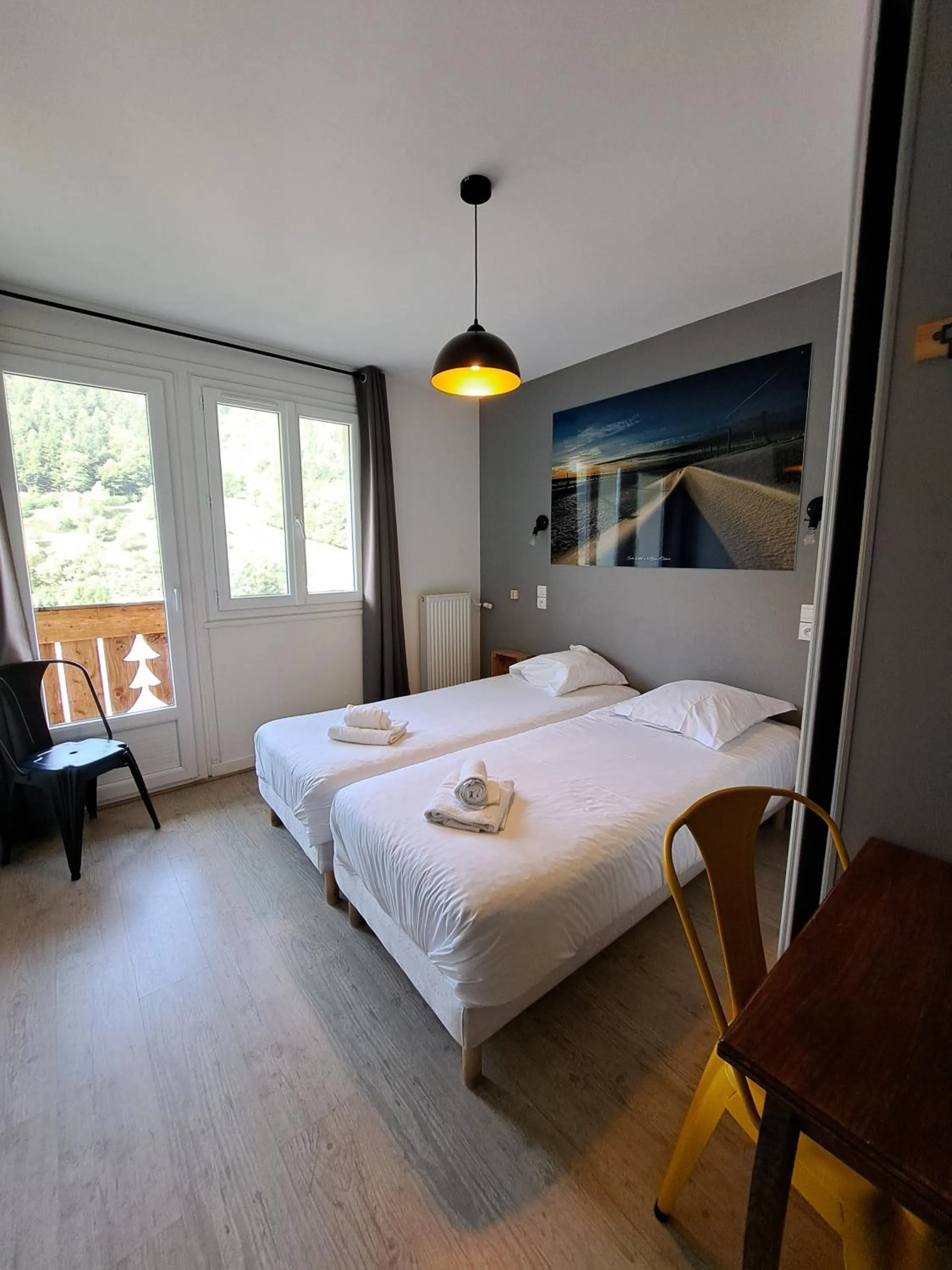 Bed in Hôtel Les Mouflons