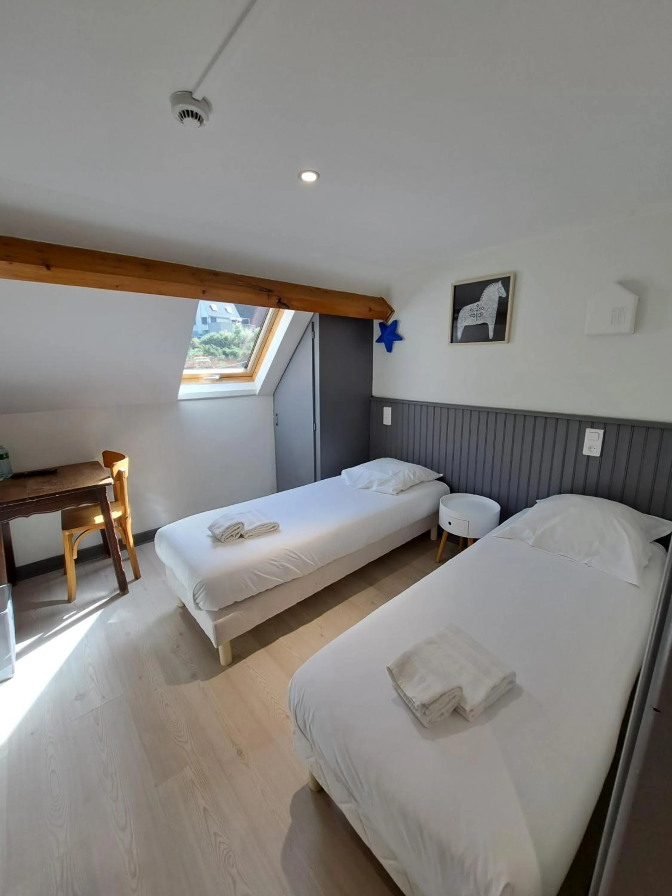 Bed in Hôtel Les Mouflons