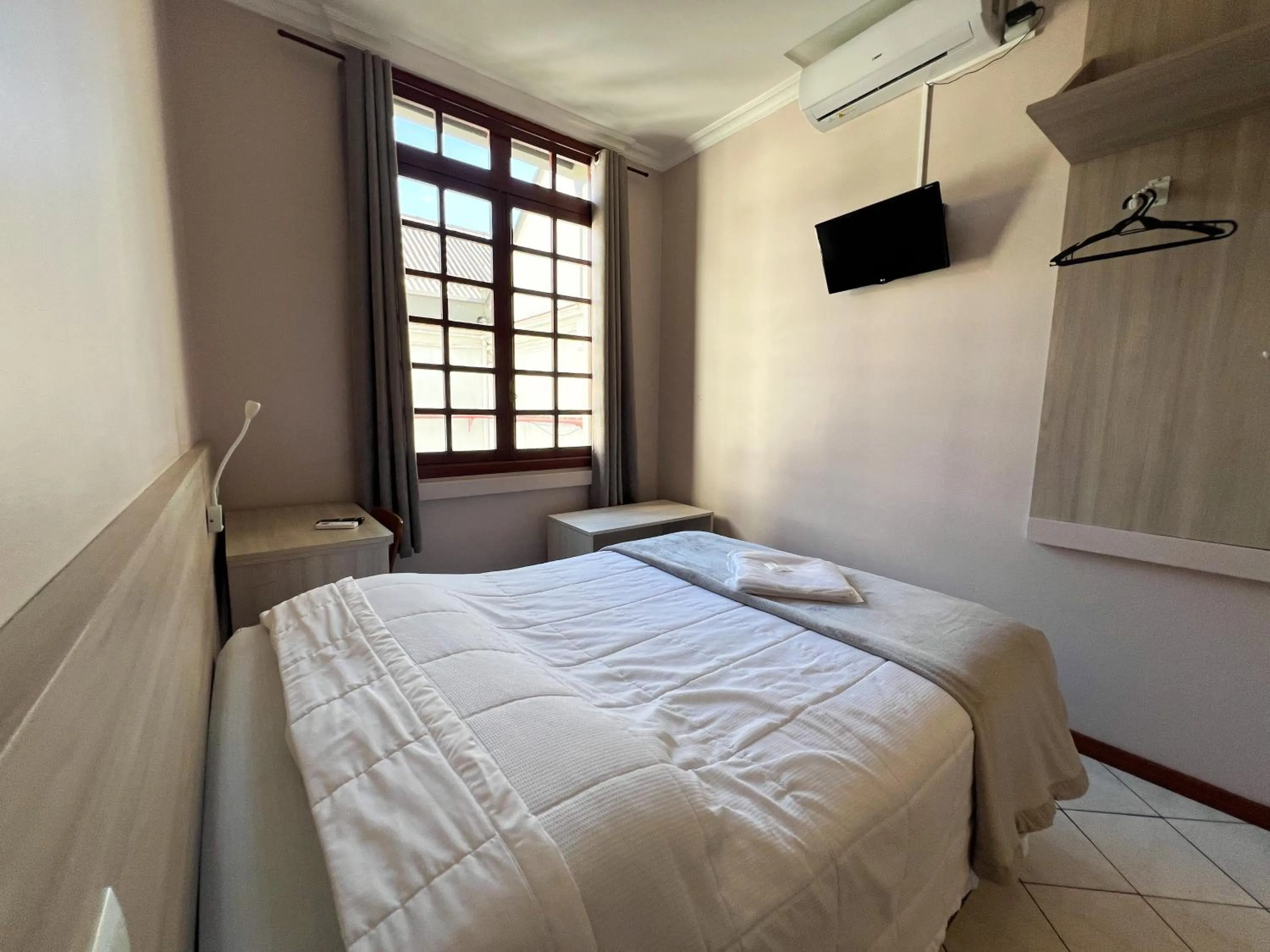 Photo of the whole room, Bed in Hotel Villa Souza Ltda