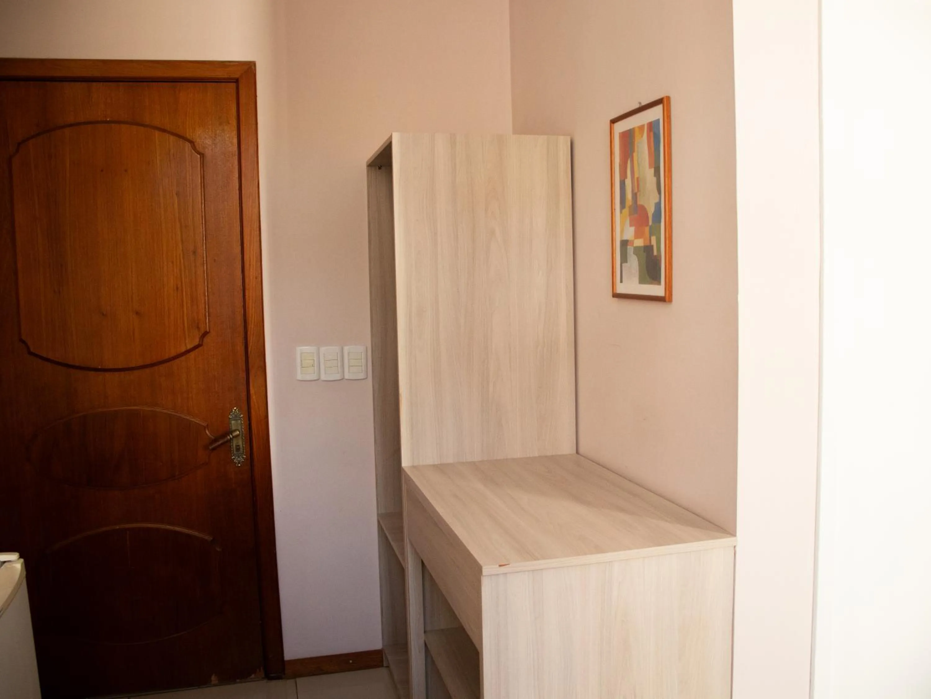 wardrobe in Hotel Villa Souza Ltda