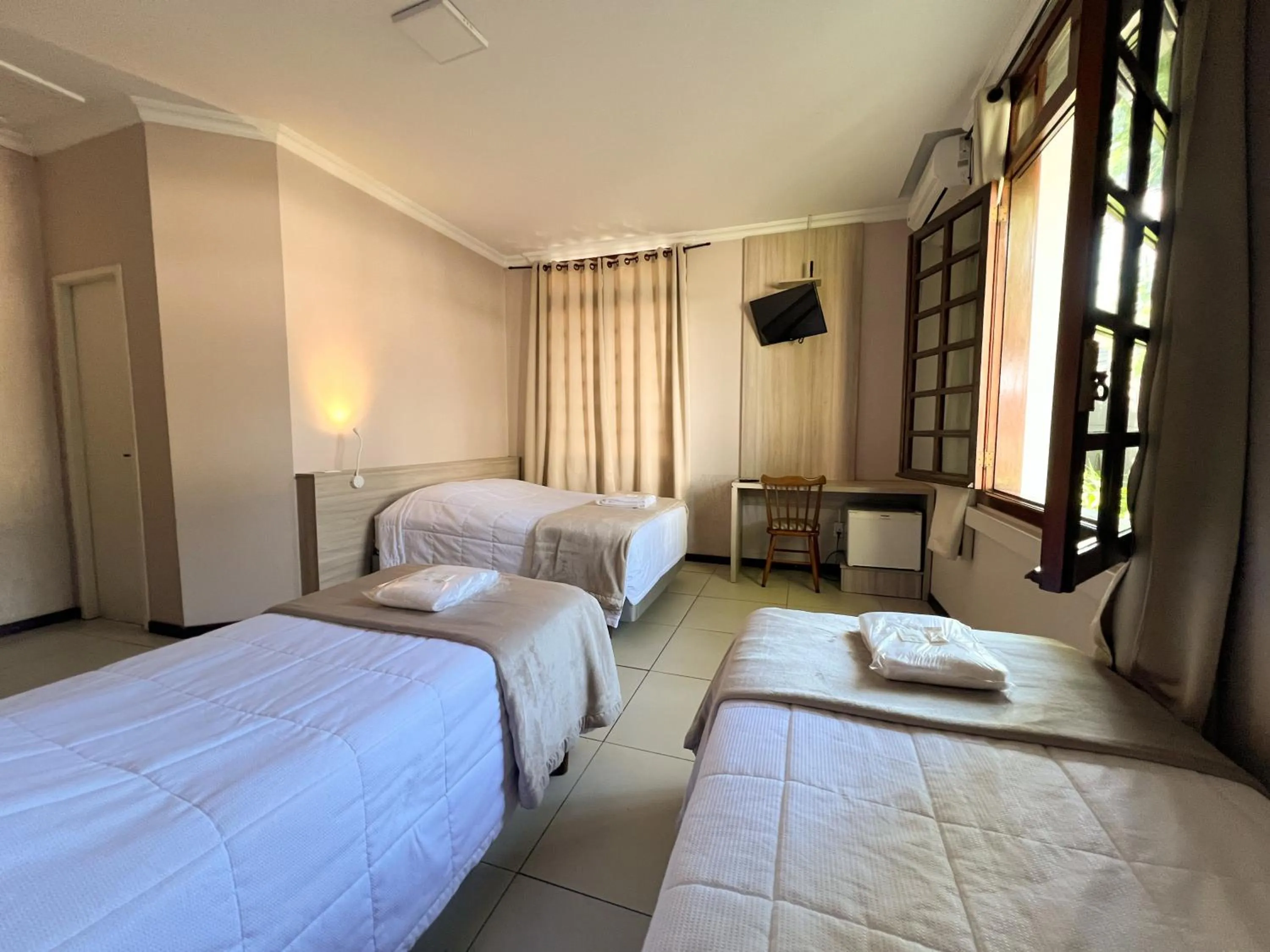 TV and multimedia, Bed in Hotel Villa Souza Ltda