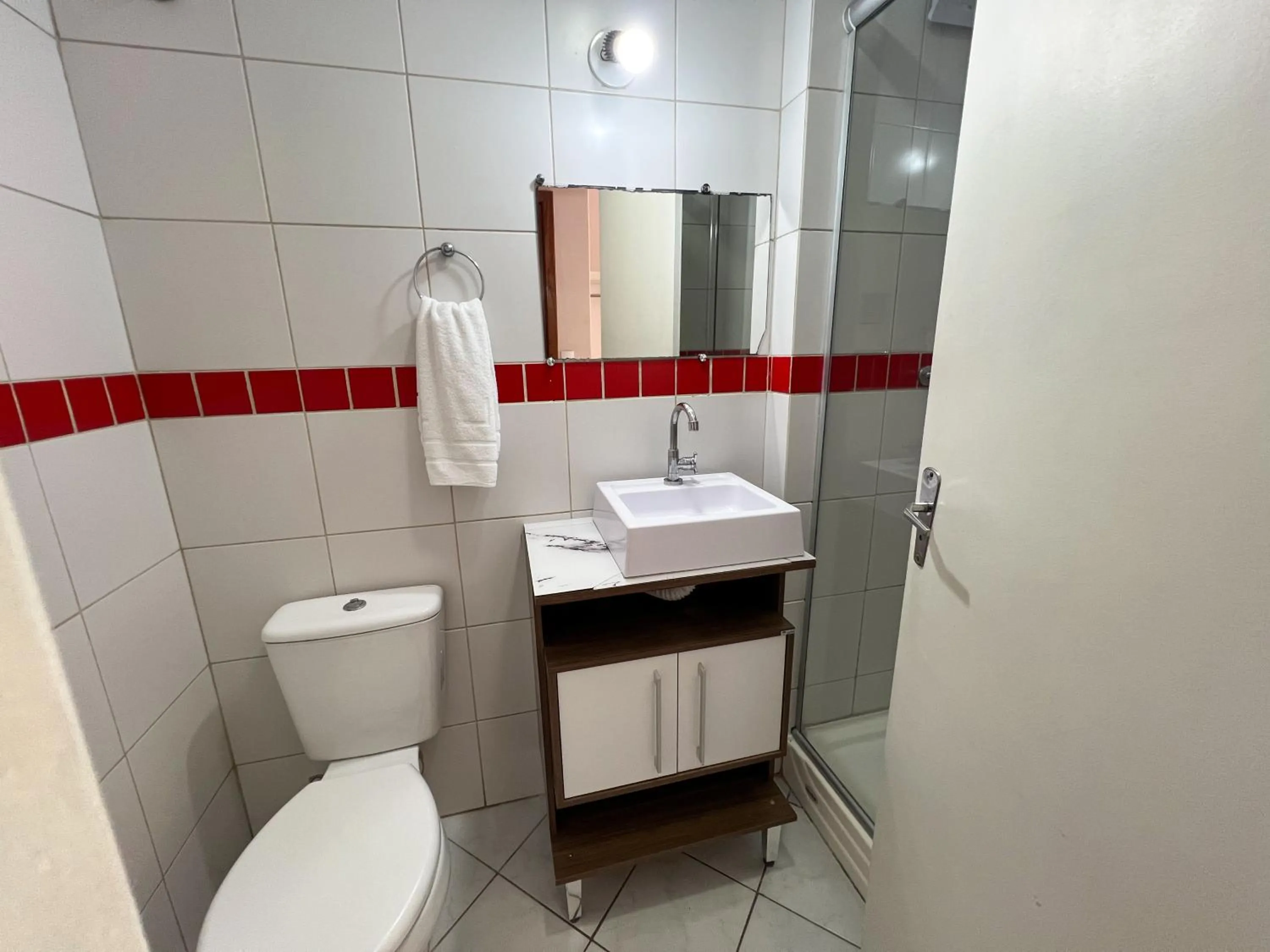 Toilet in Hotel Villa Souza Ltda