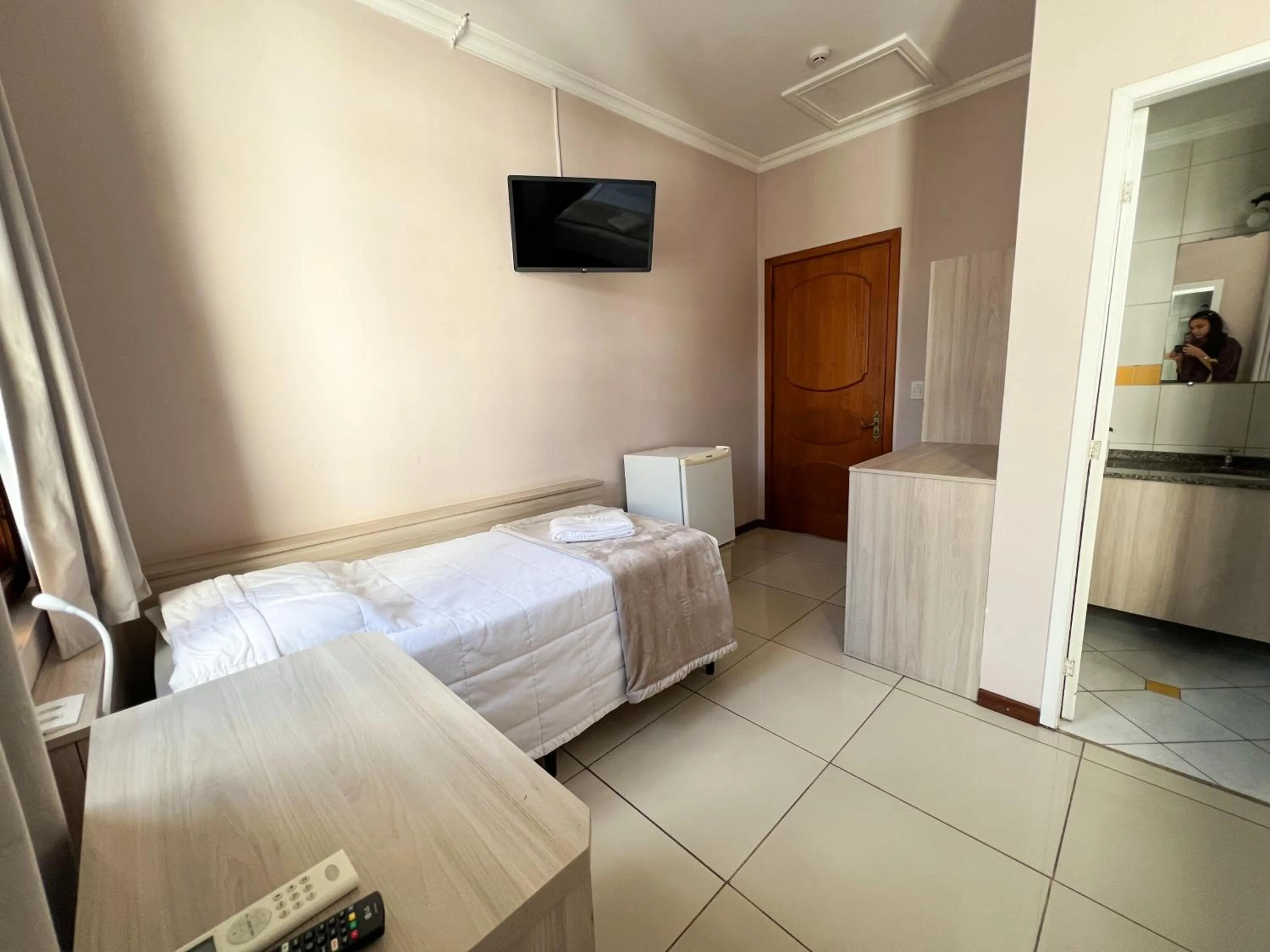 TV and multimedia, Bed in Hotel Villa Souza Ltda