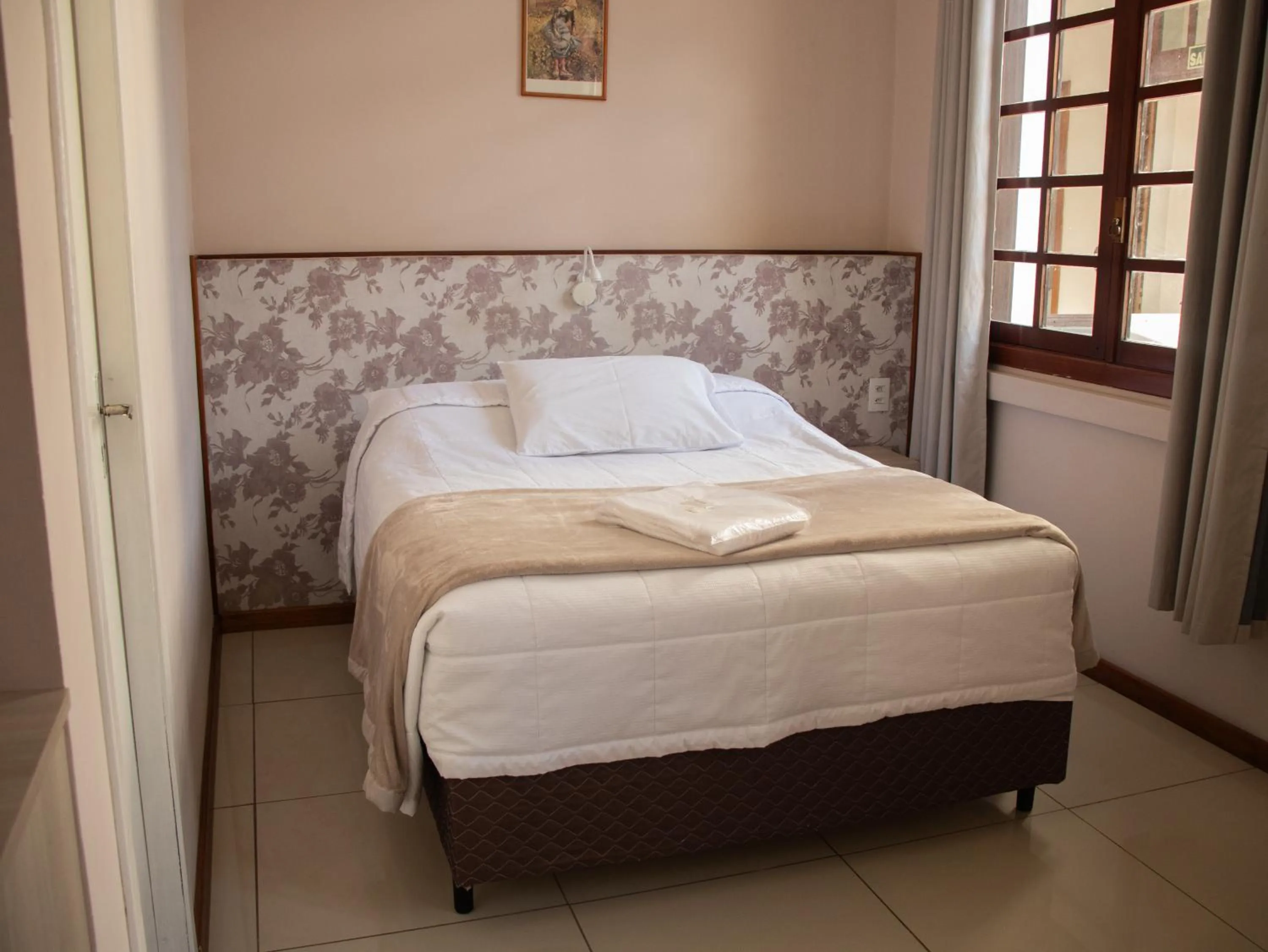 Bed in Hotel Villa Souza Ltda