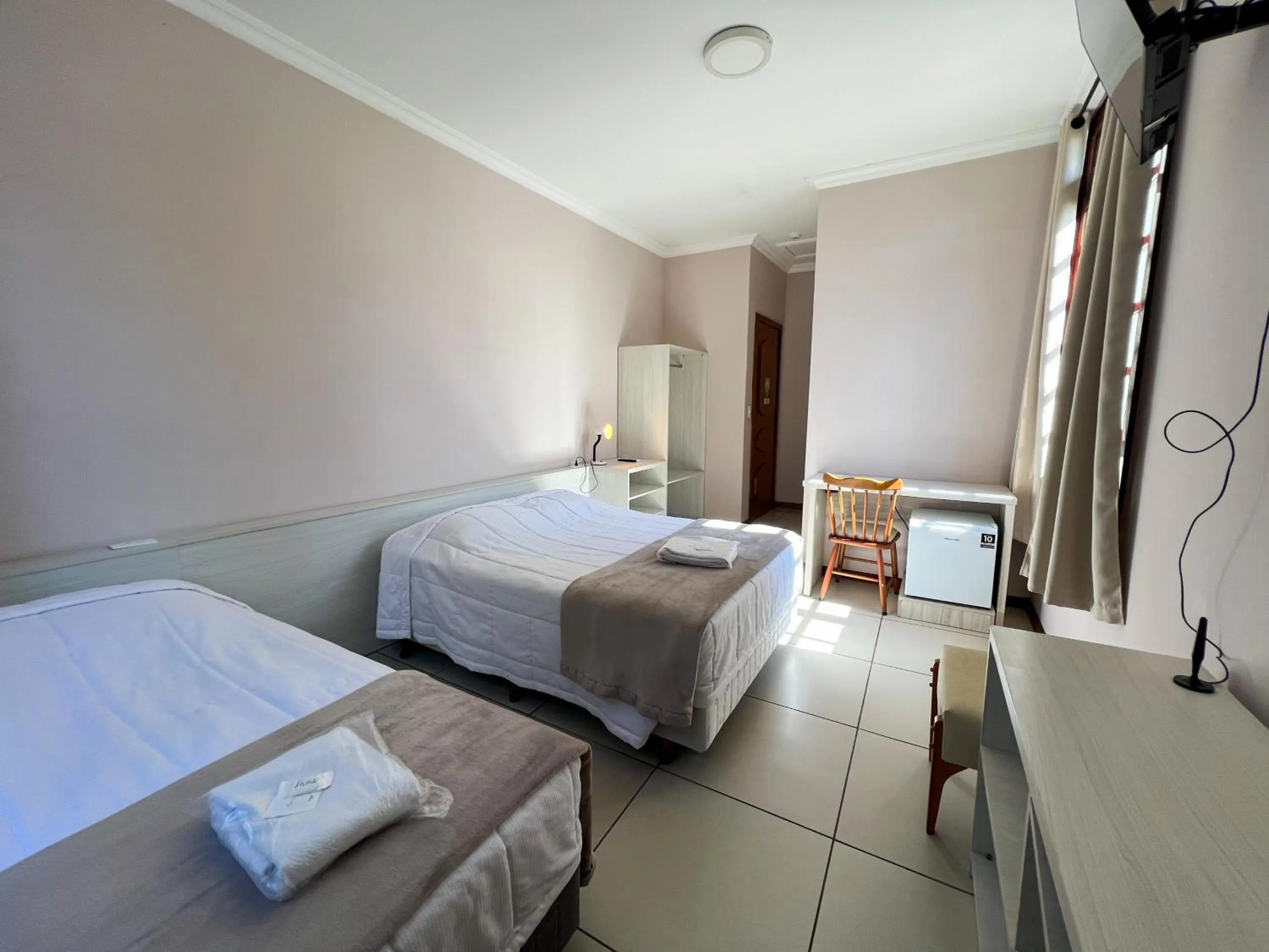 Photo of the whole room, Bed in Hotel Villa Souza Ltda