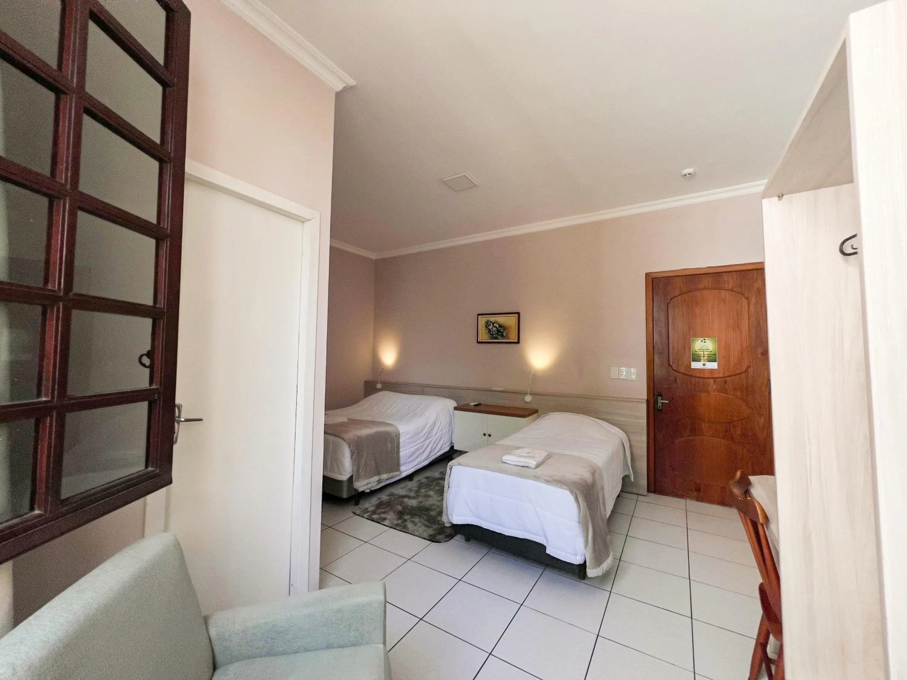 Photo of the whole room, Bed in Hotel Villa Souza Ltda