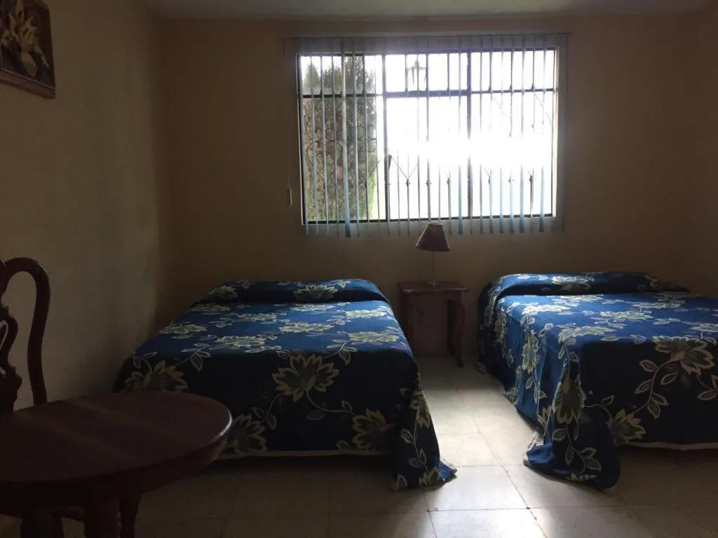 Bed in Hotel Lienzo Charro 1