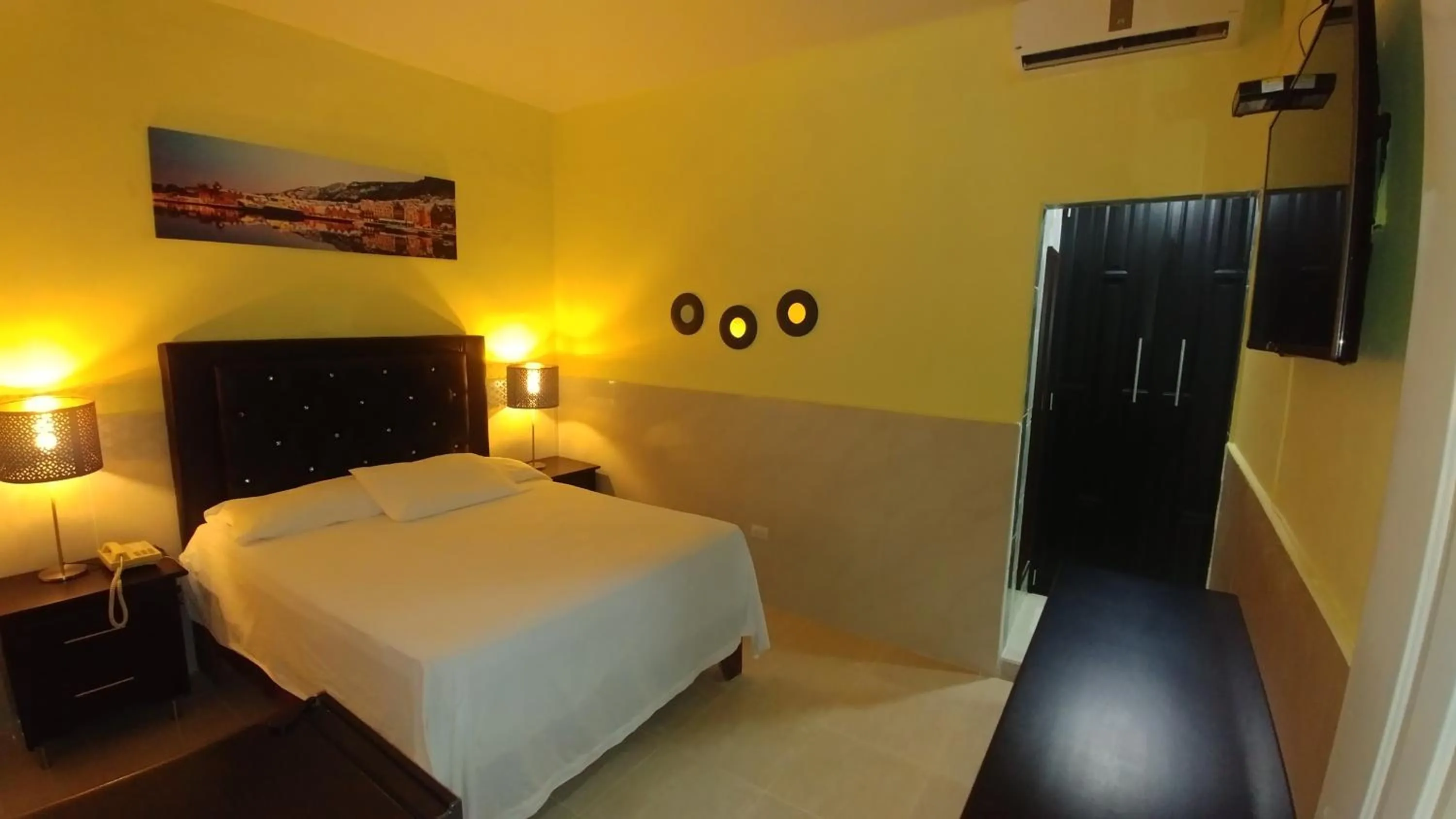 Bed in Hotel Riparbella