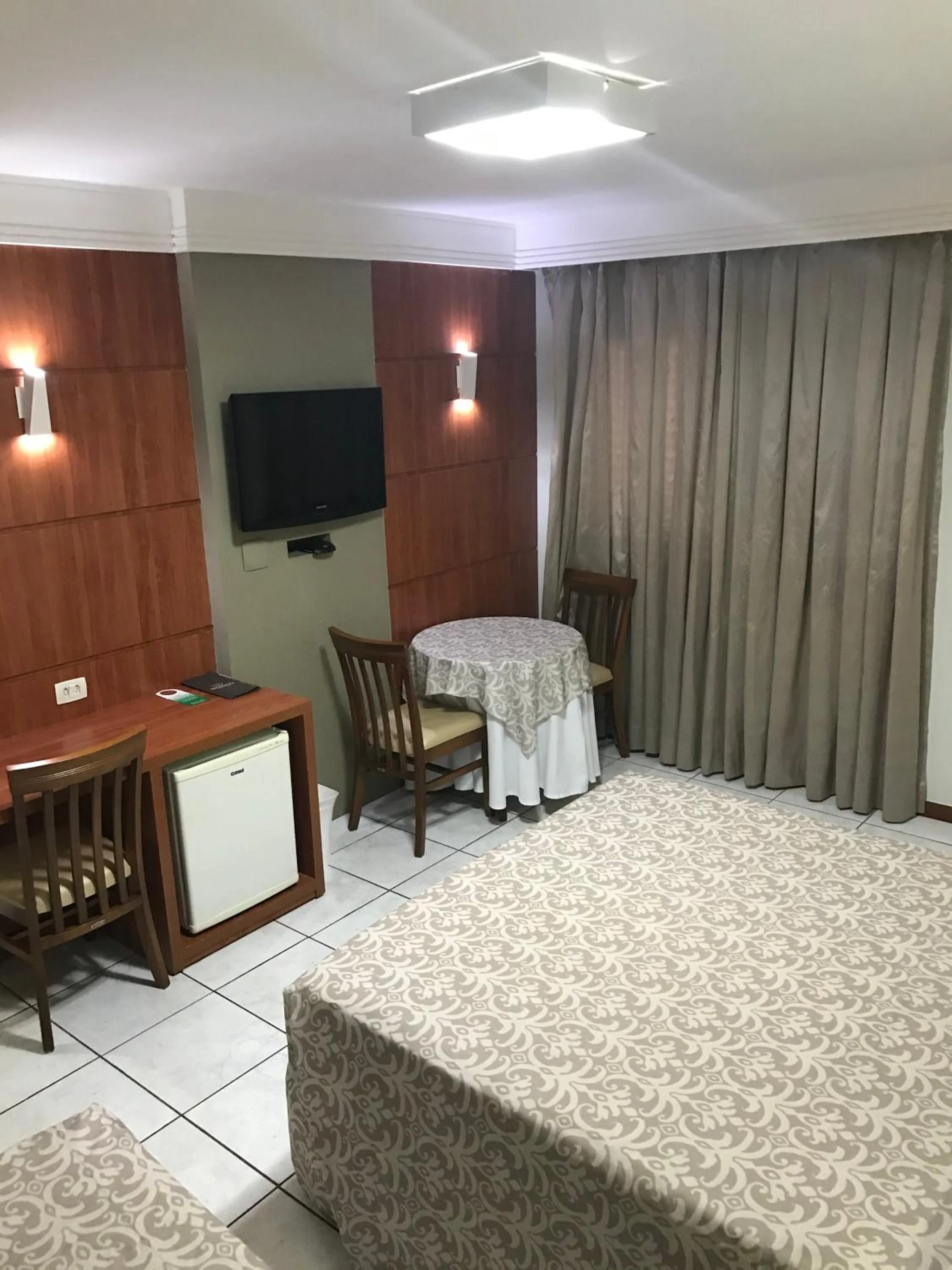 TV and multimedia, Bed in Brumado Hotel