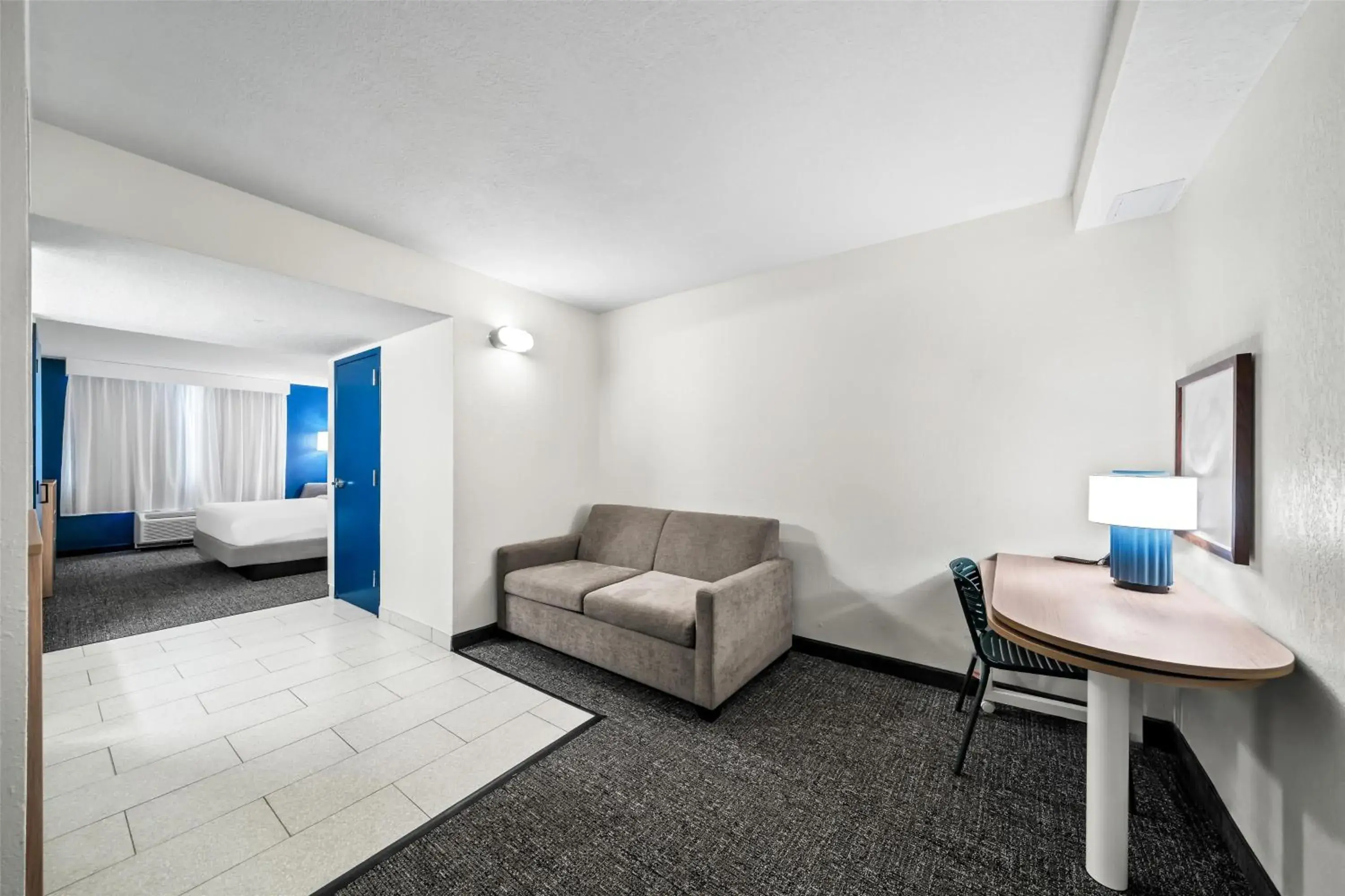 Living room, Bed in Spark by Hilton Orlando near Universal Living room, Bed in Spark by Hilton Orlando near Universal