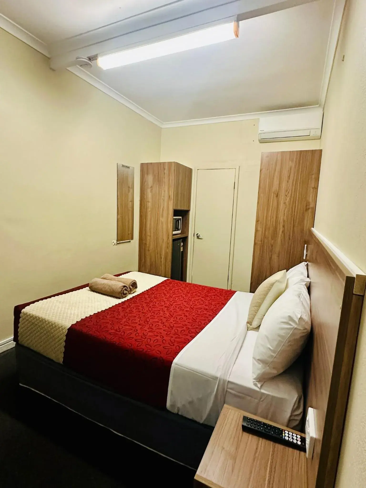 Bed in Wattle Tree Motel Bed in Wattle Tree Motel