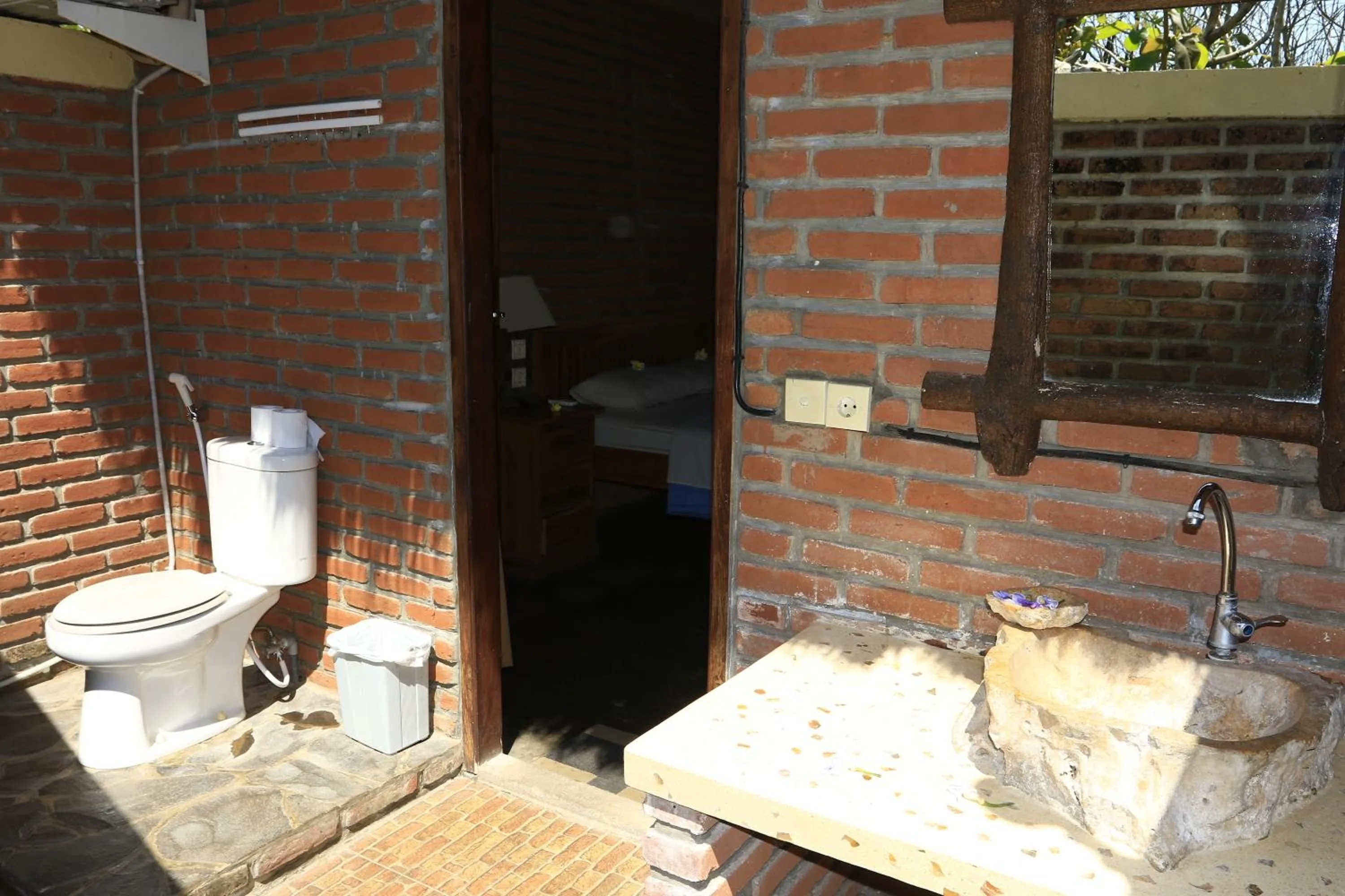 Bathroom in Satria Bungalow