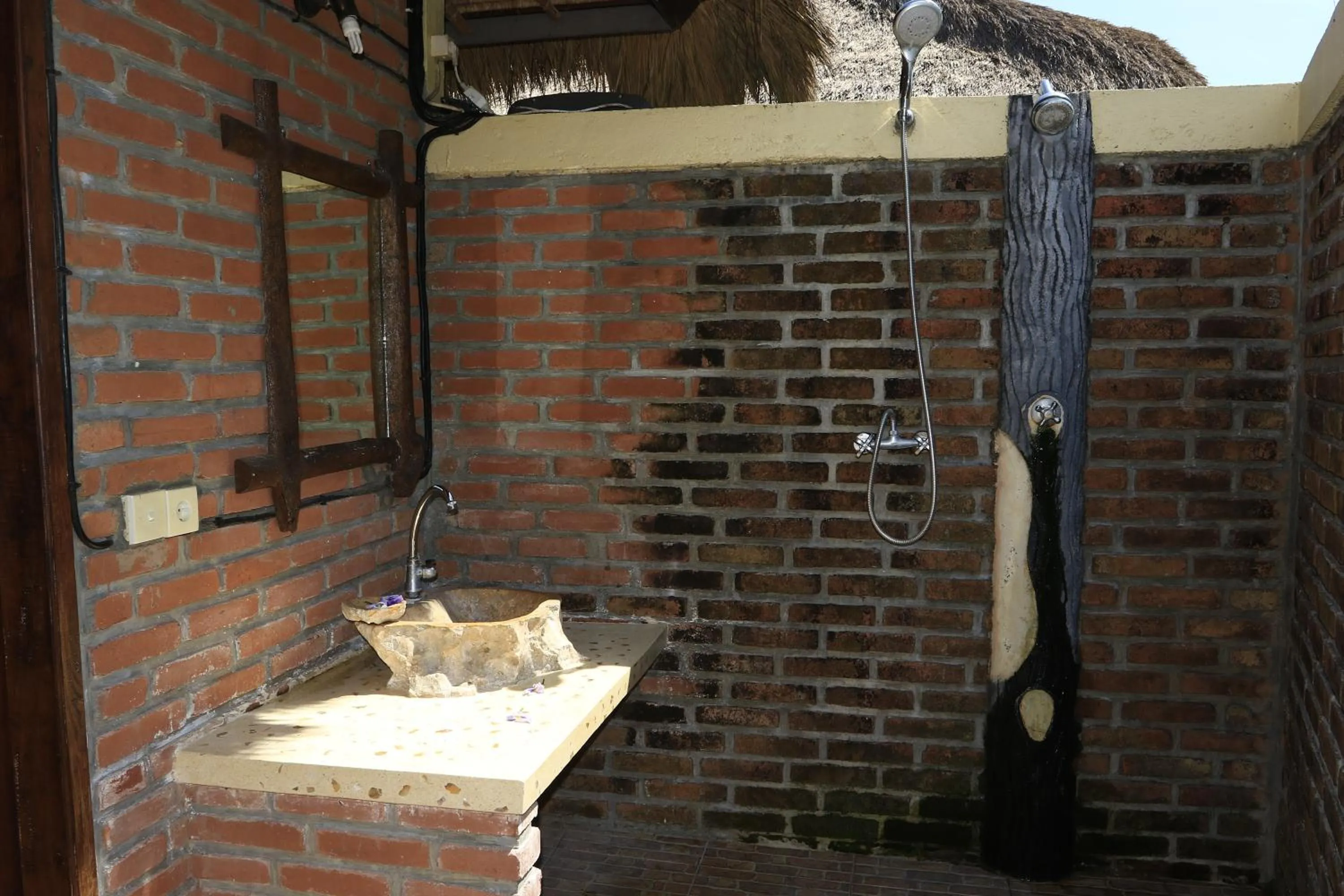 Bathroom in Satria Bungalow