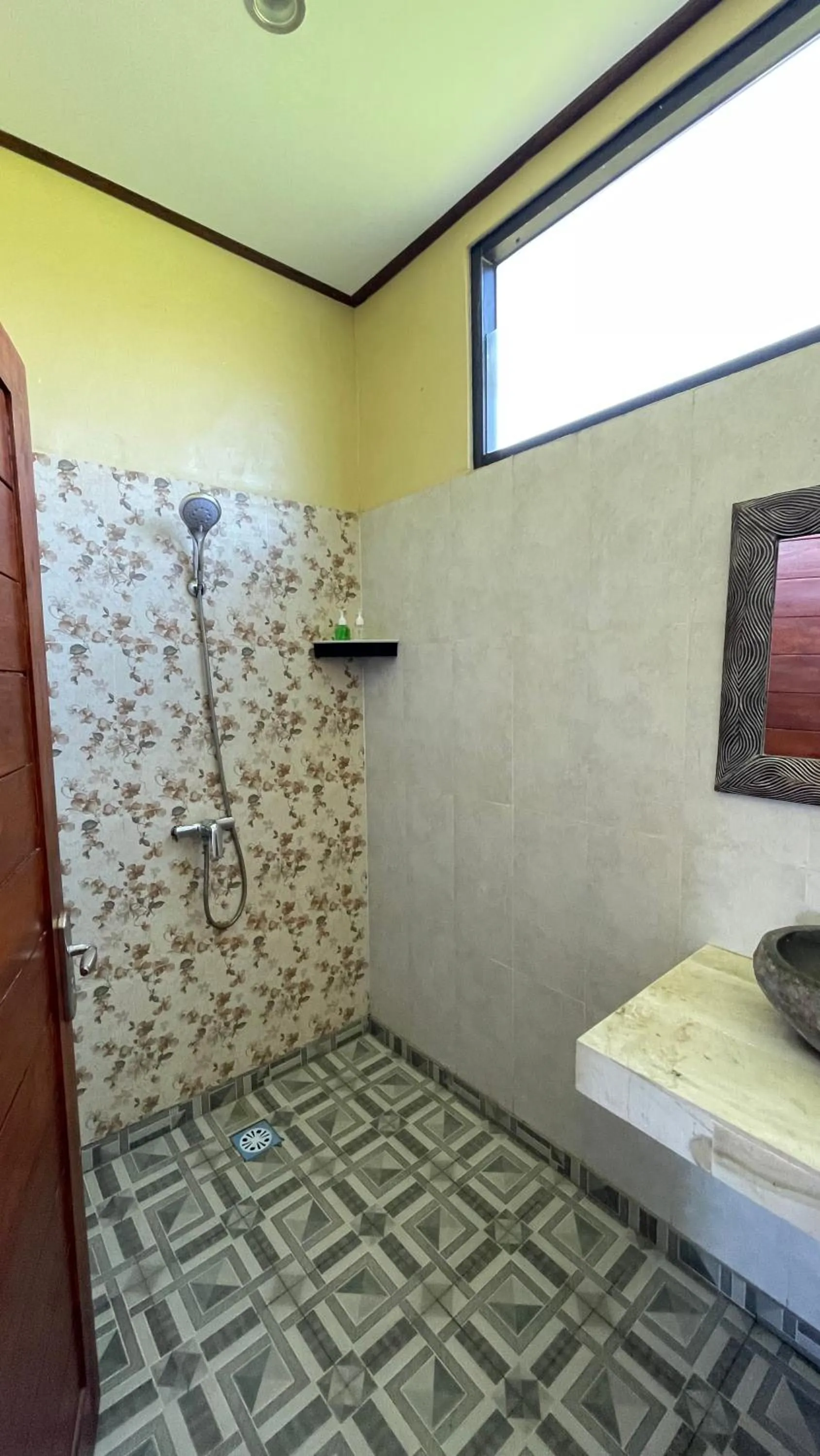 Bathroom in Satria Bungalow