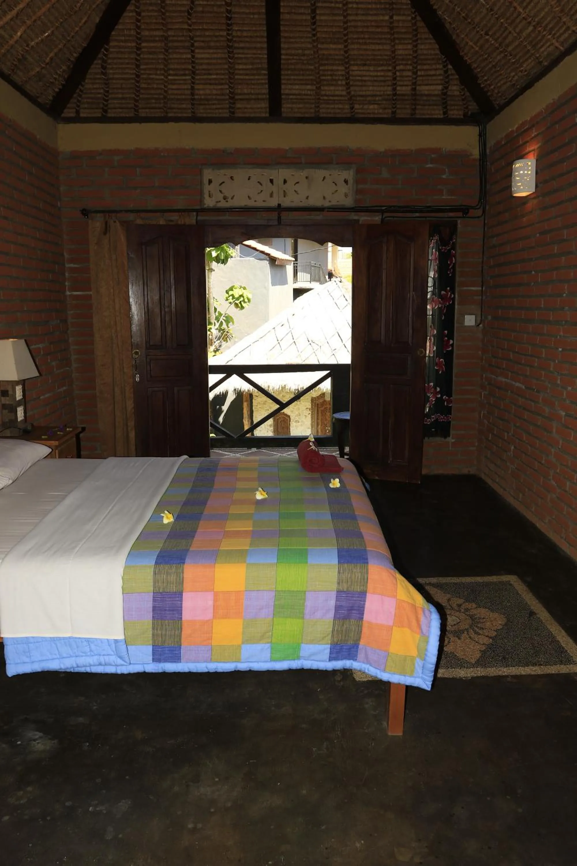 Photo of the whole room, Bed in Satria Bungalow
