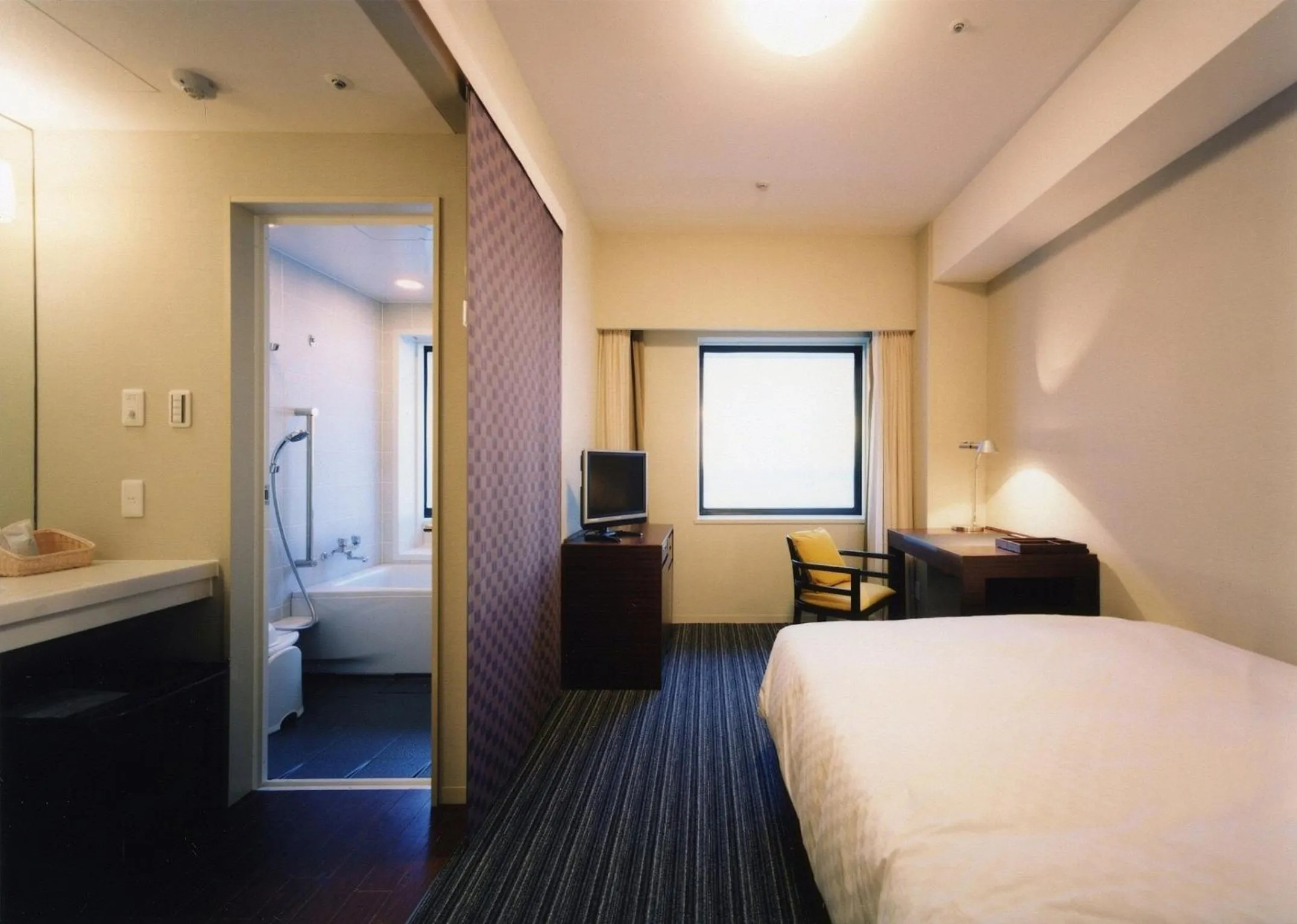 Photo of the whole room, Bed in Centrair Hotel