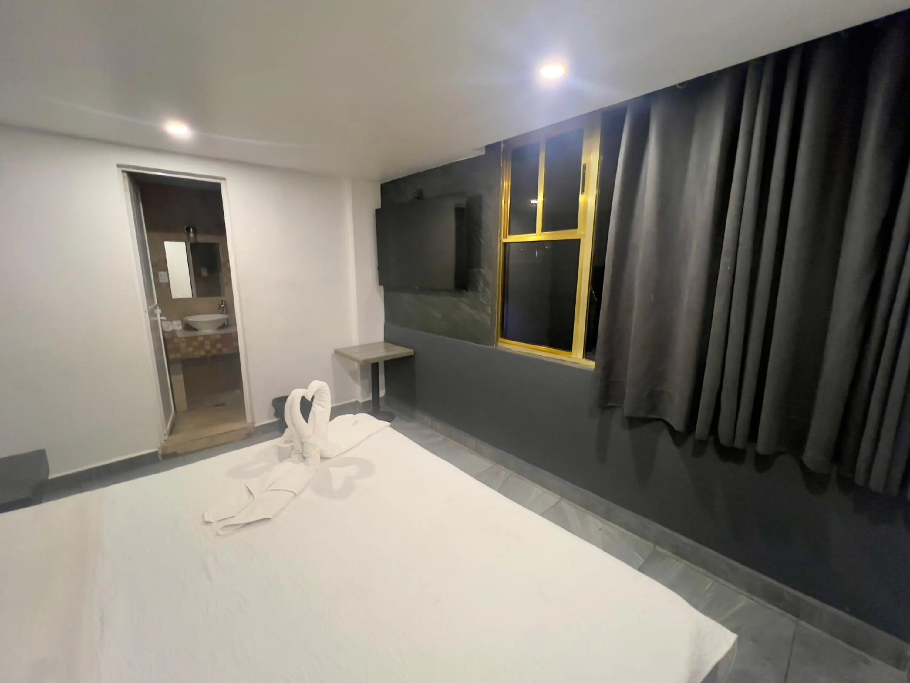 Bed in Hotel Aquario