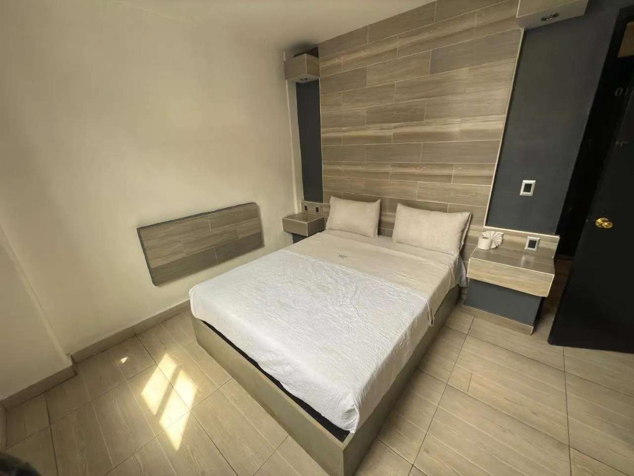 Bed in Hotel Aquario