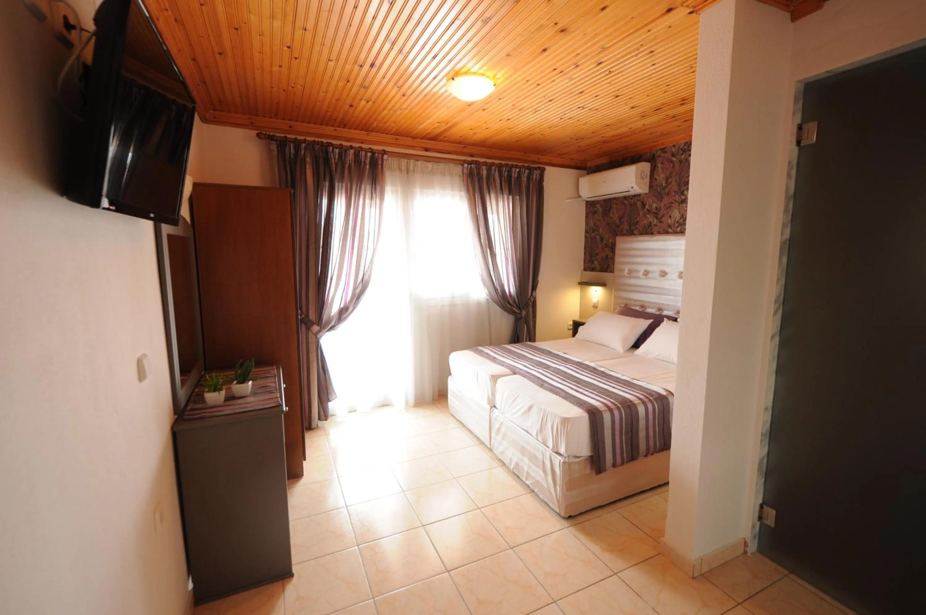 Bed in Hotel Asterias