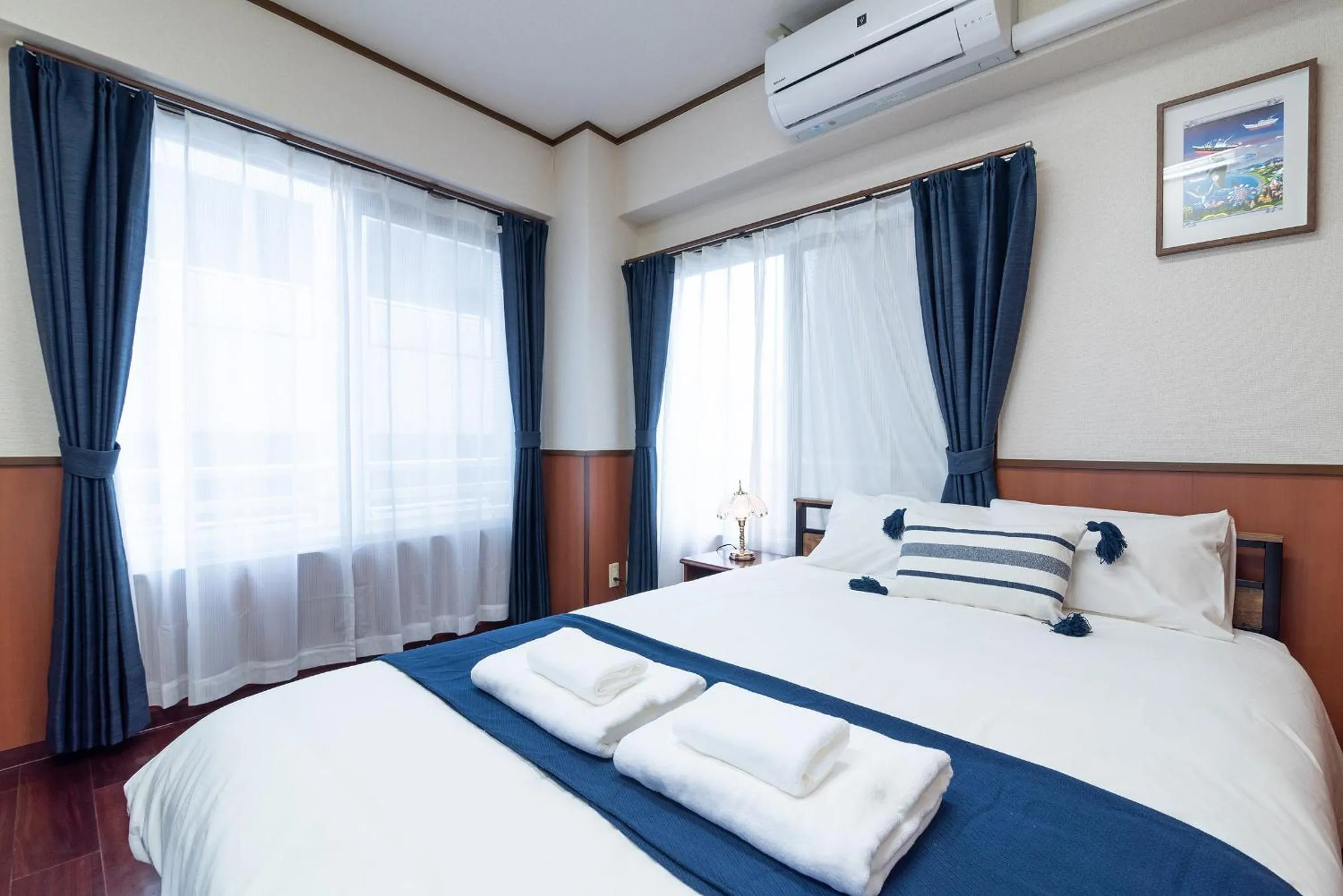 Bed in Uhome Iriya Apartment