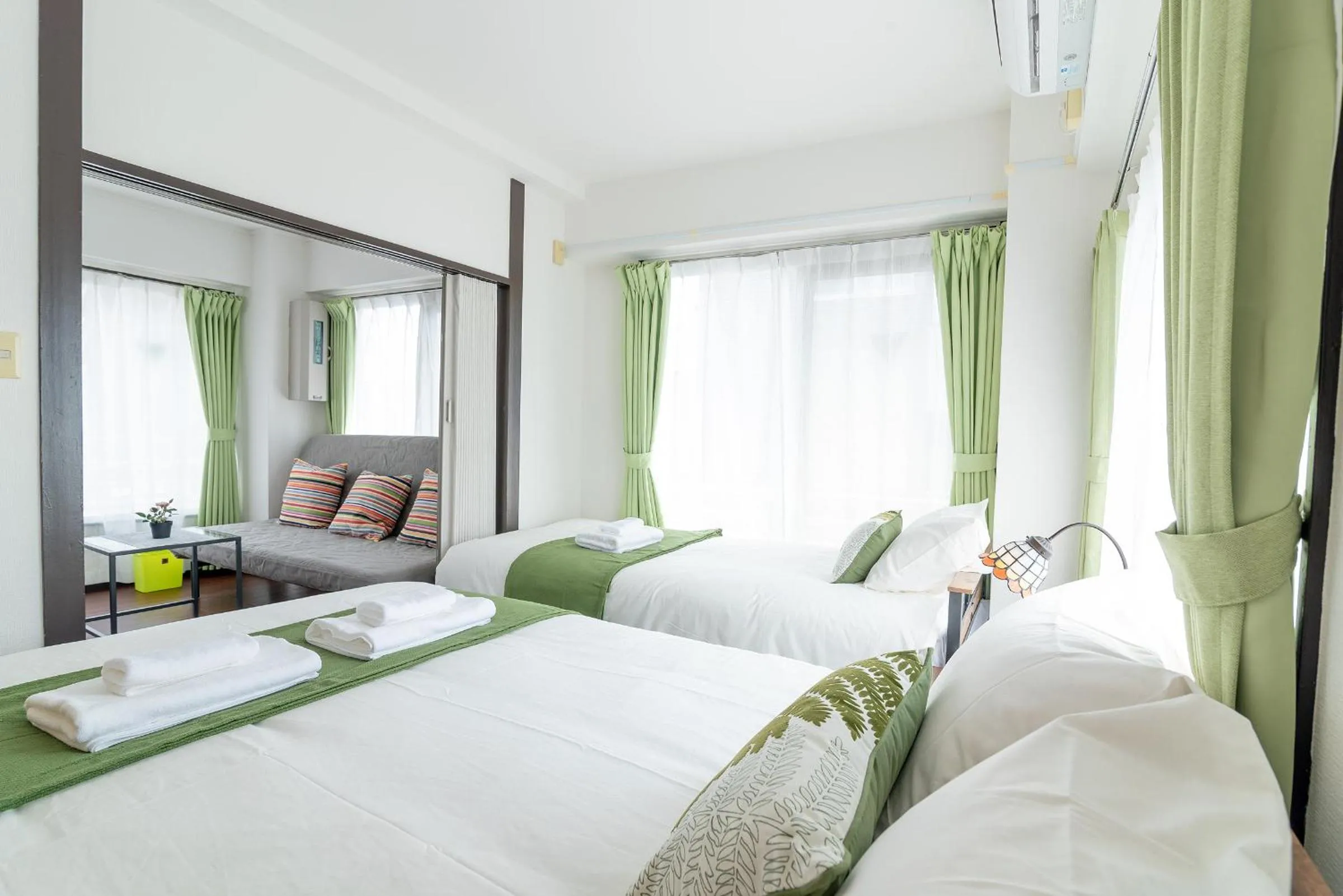 Bed in Uhome Iriya Apartment