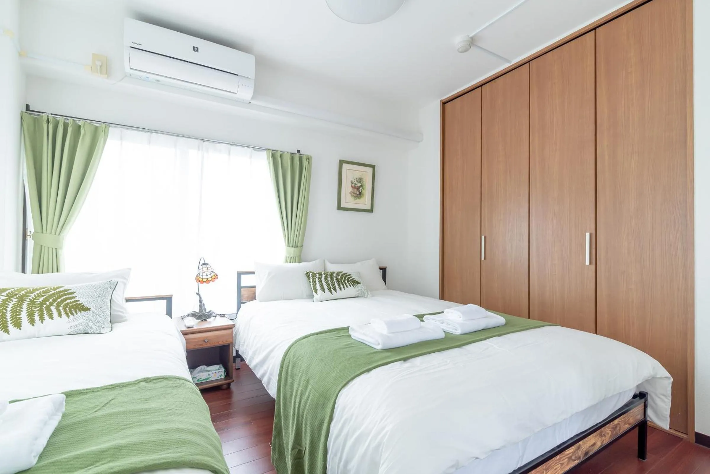 Bed in Uhome Iriya Apartment