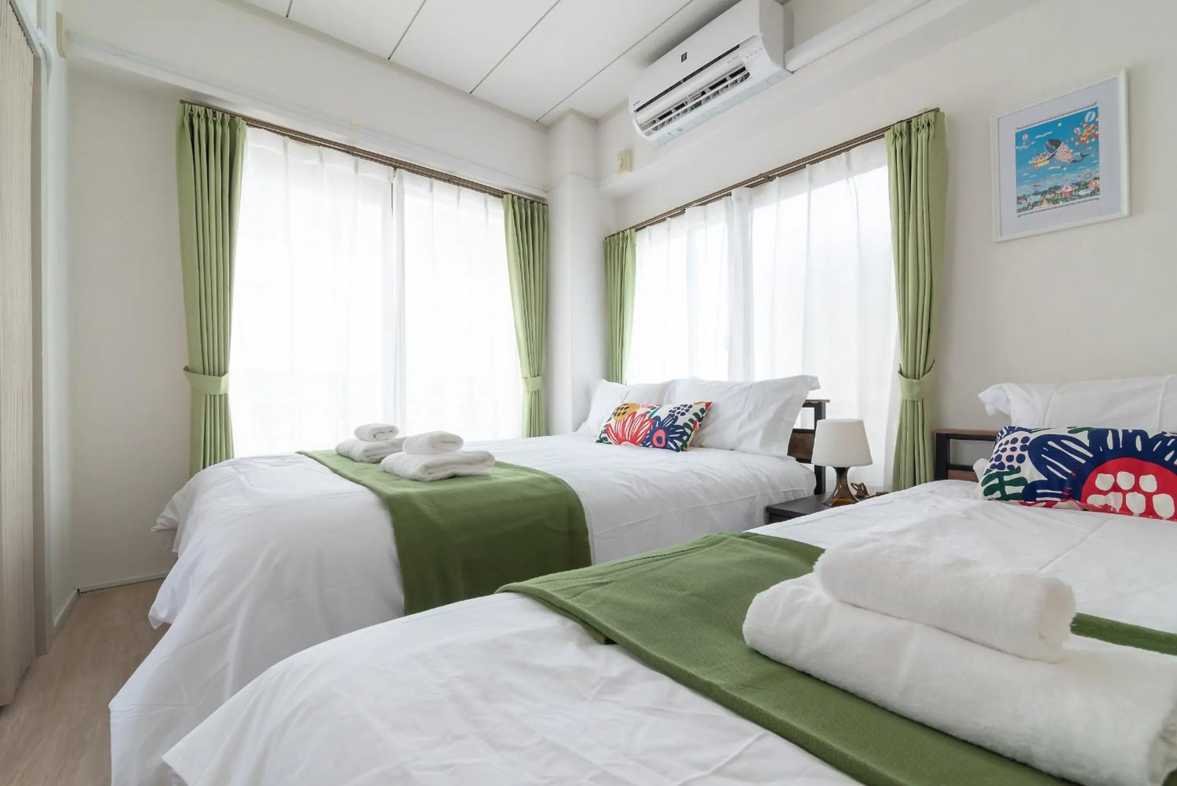 Bed in Uhome Iriya Apartment