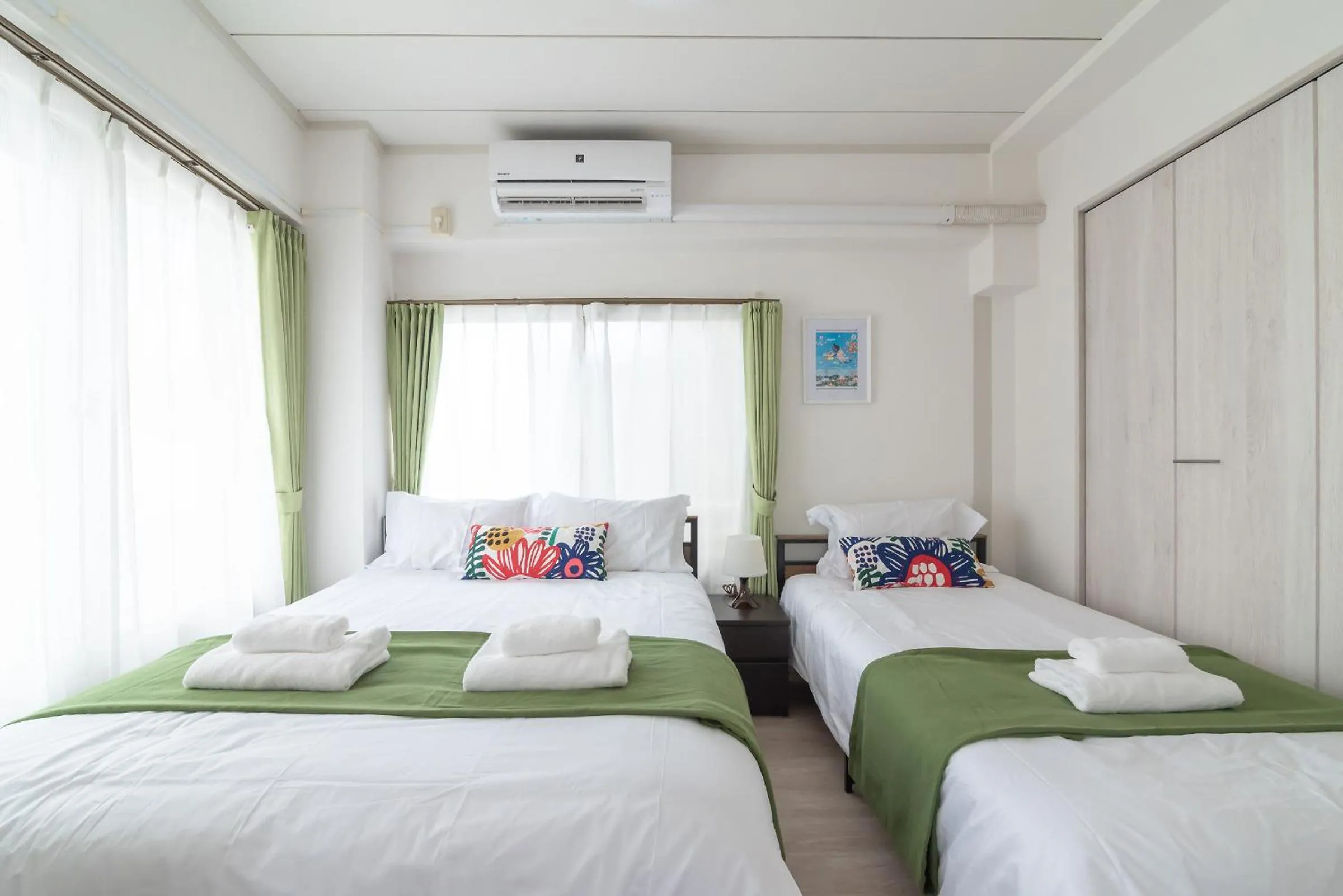 Bed in Uhome Iriya Apartment