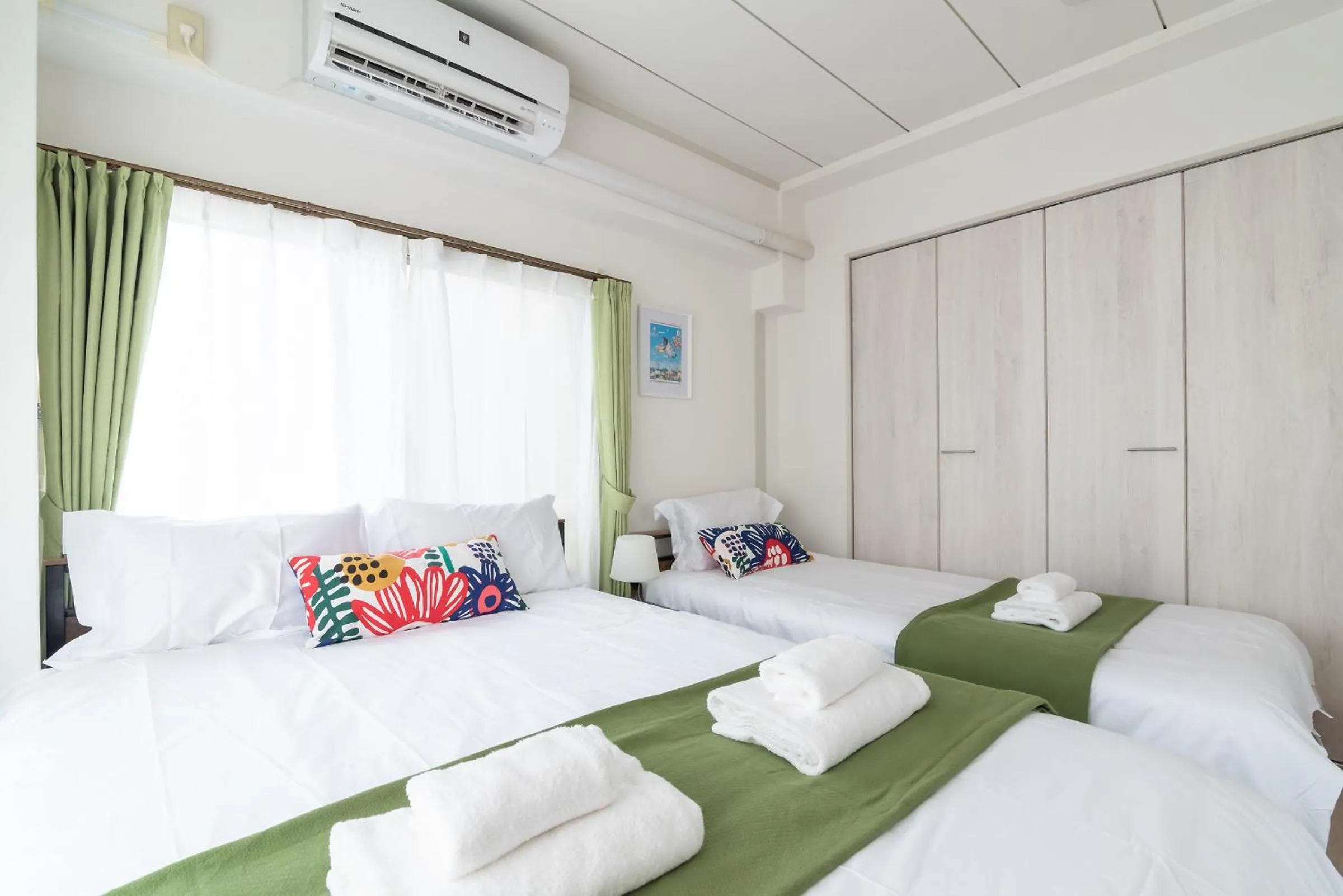 Bed in Uhome Iriya Apartment