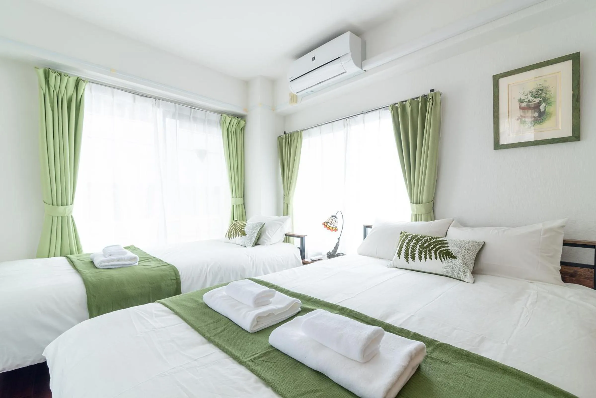Bed in Uhome Iriya Apartment