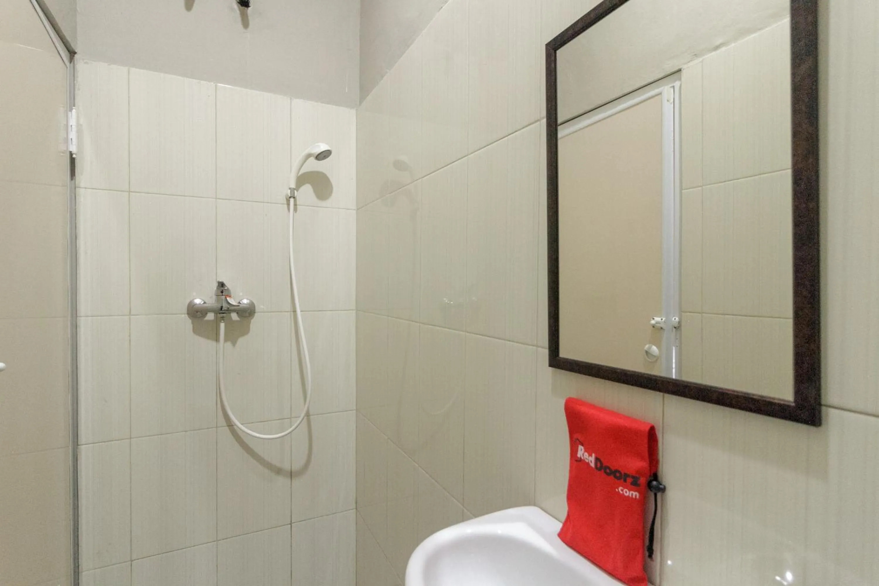 Bathroom in RedDoorz near Puri Indah Mall