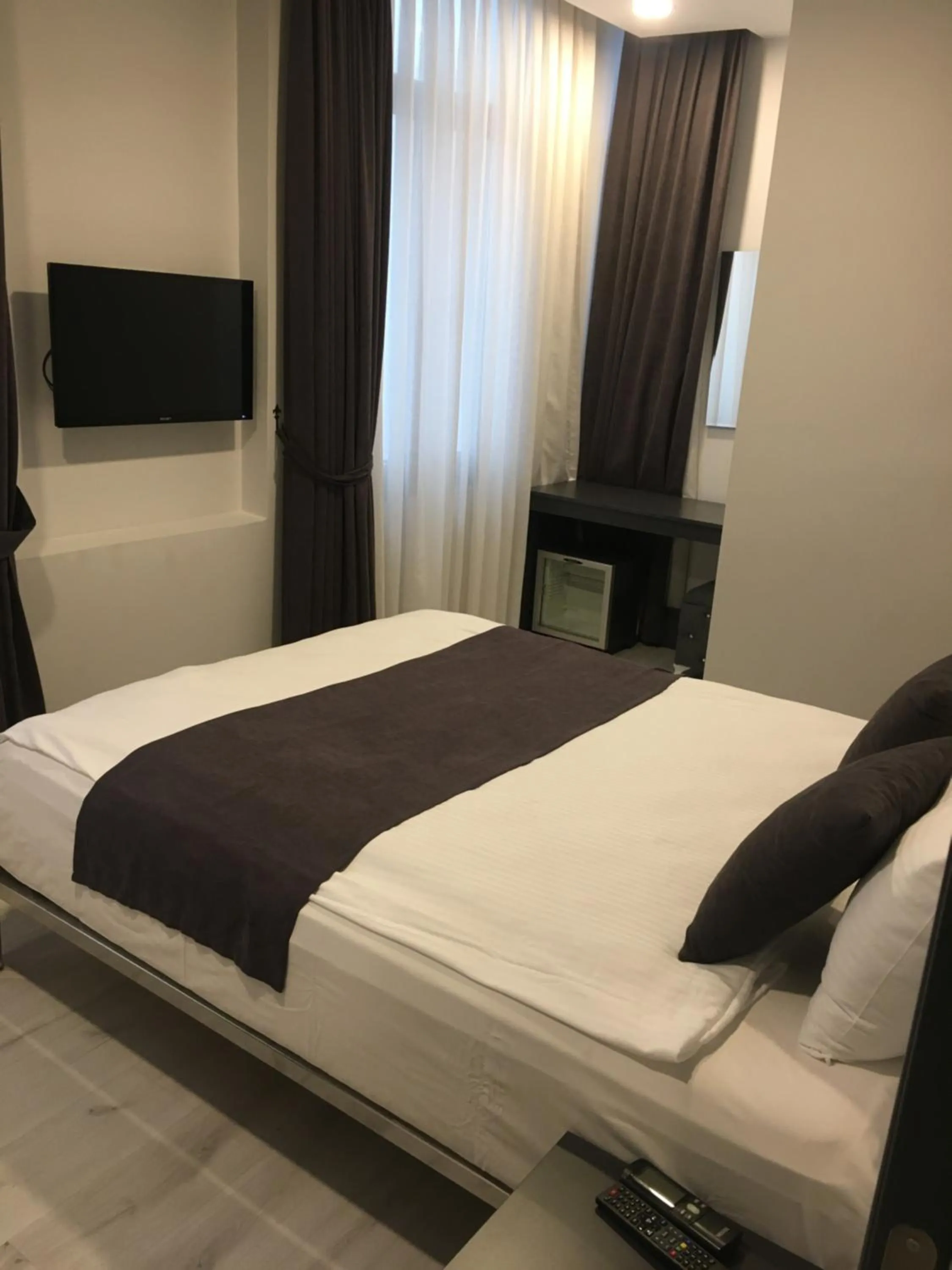 Bed in Lime Garden Hotel