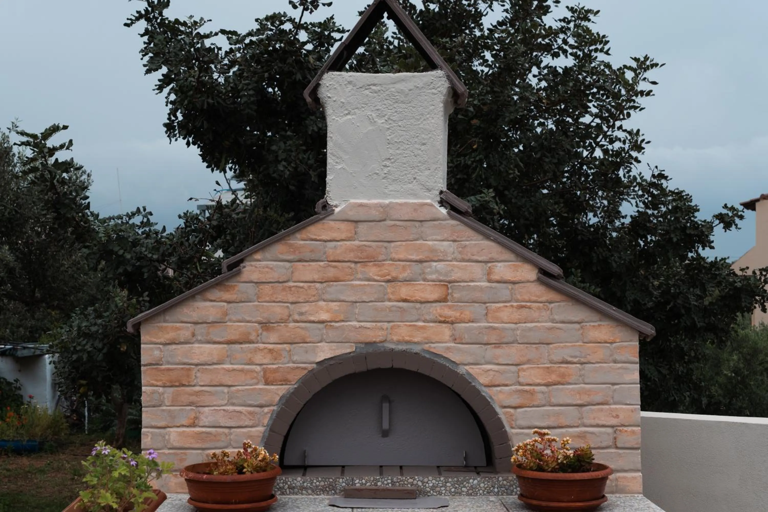 BBQ facilities in Aspri Petra Apartments