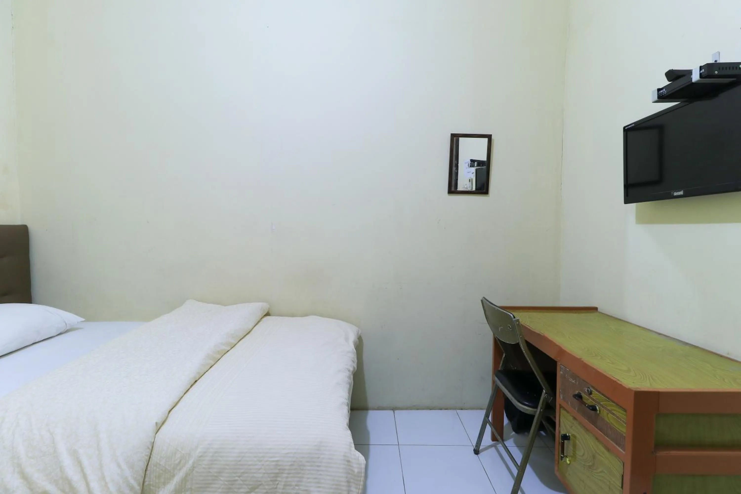Bed in Guest House Samarinda