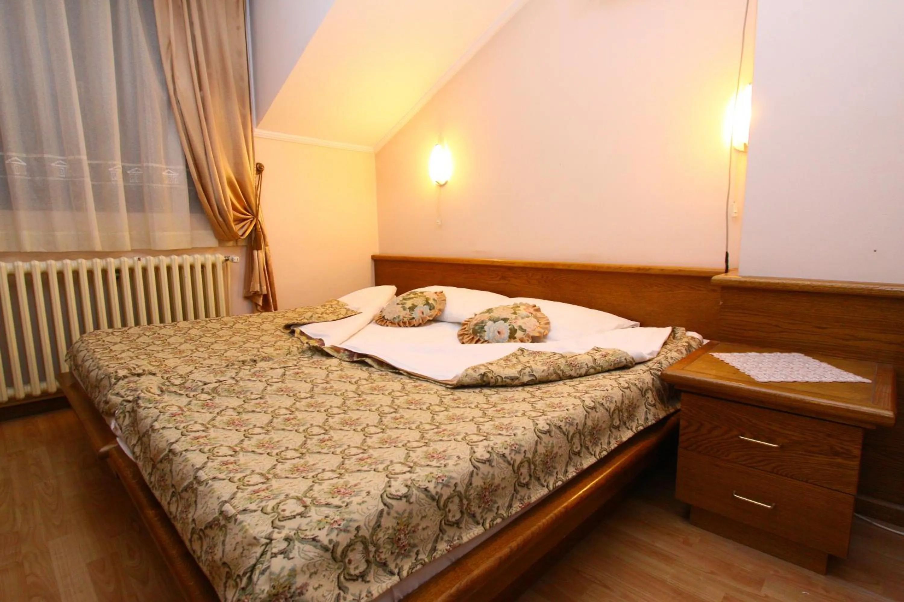 Photo of the whole room, Bed in Garni Hotel PBG