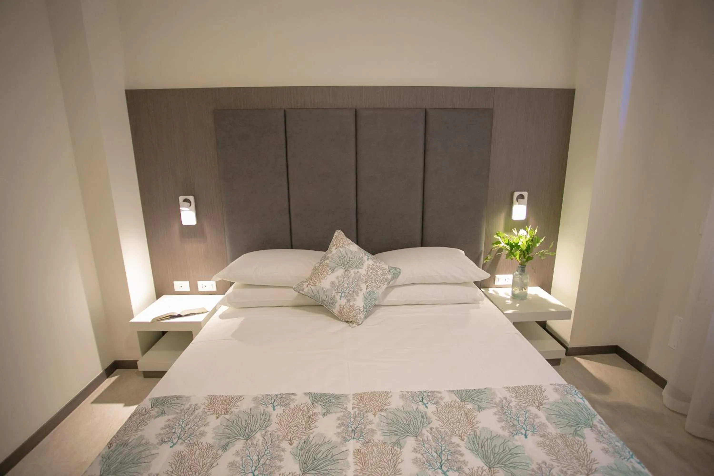 Bed in Mosella Suite Hotel