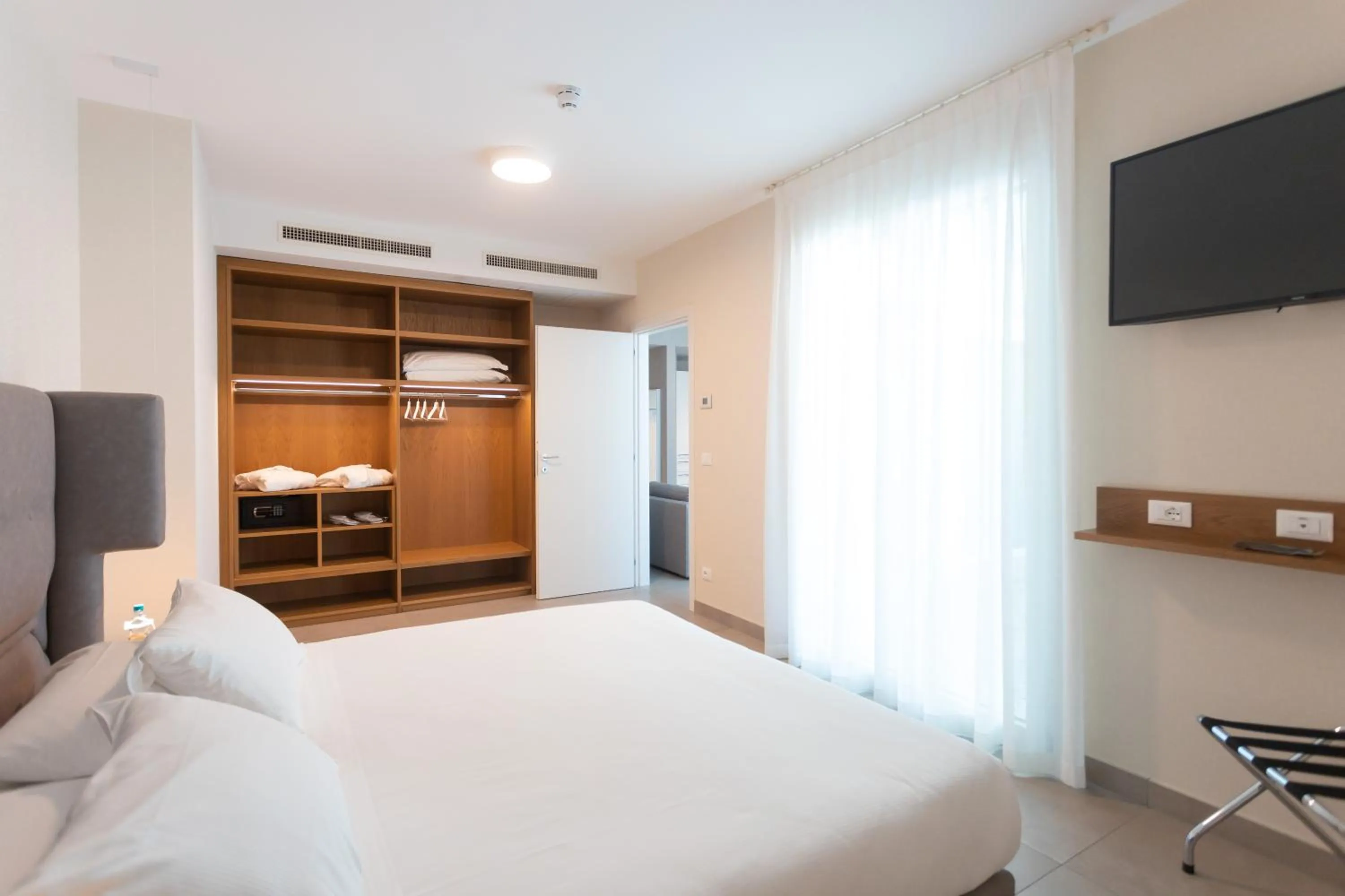 Bed in Mosella Suite Hotel