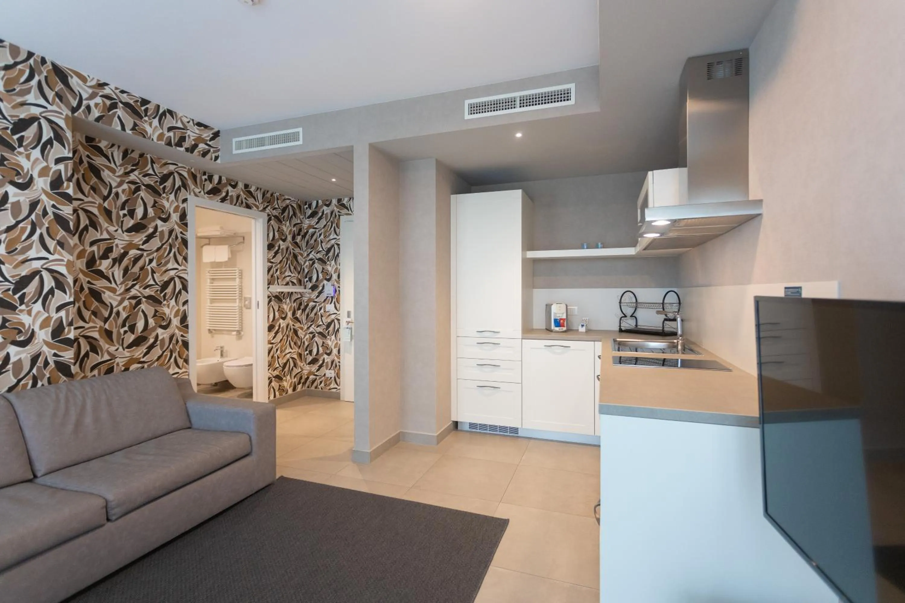 Kitchen or kitchenette in Mosella Suite Hotel