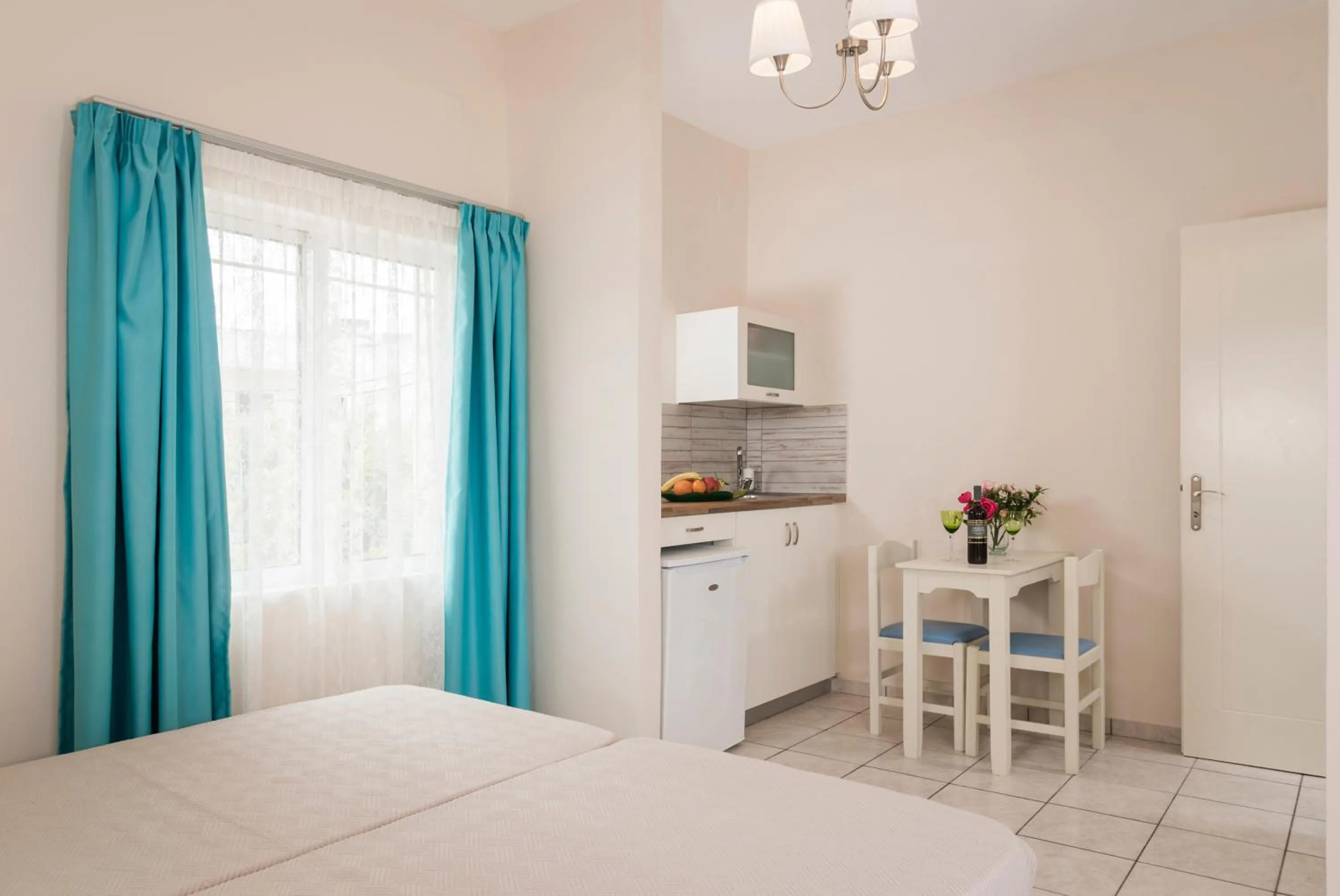 Kitchen or kitchenette, Bed in Hermes Beach Front