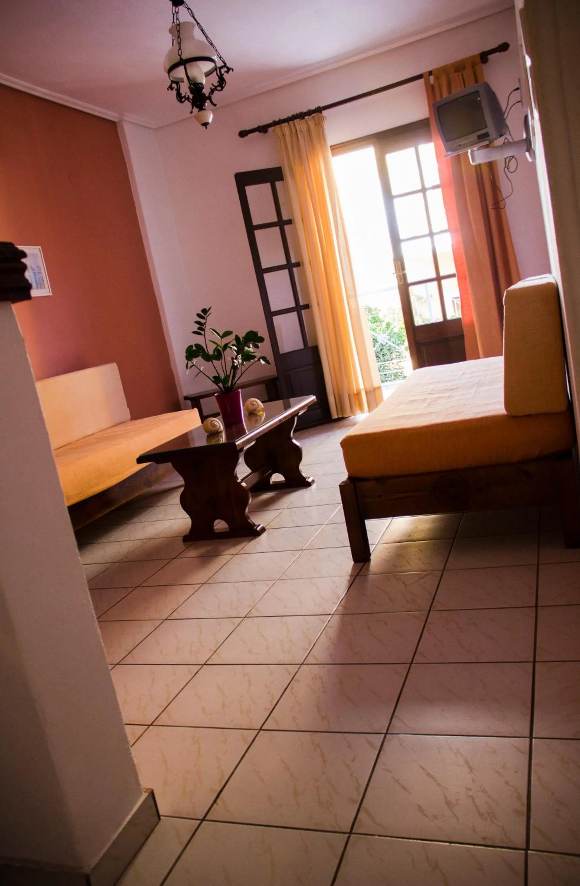 Living room, Bed in Hesperia Hotel